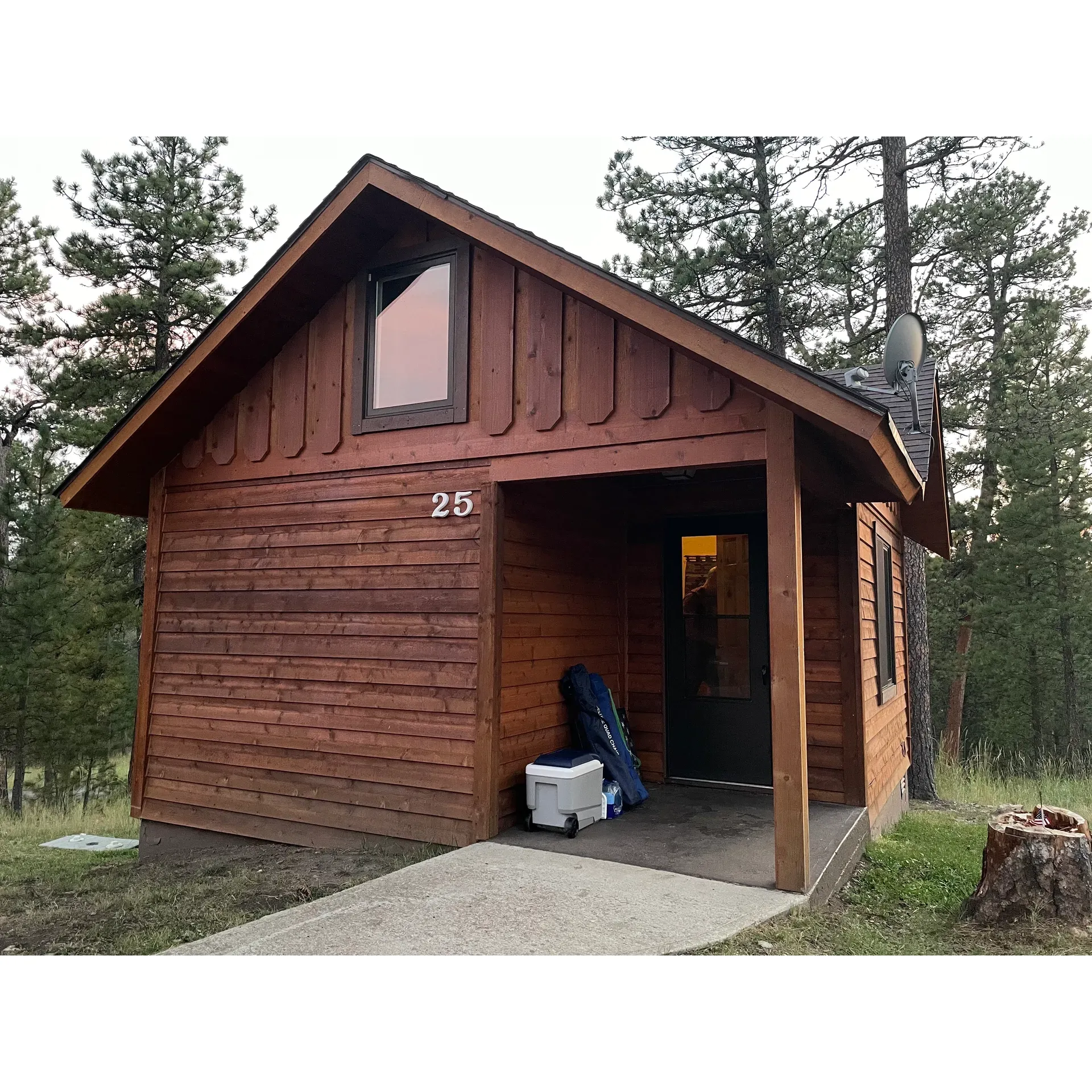 Discover a pristine oasis perfectly positioned within the expansive Custer State Park at Legion Lake Campgrounds. Known for its impeccable cleanliness and friendly, attentive staff, this campground is an ideal retreat for outdoor enthusiasts. Upon arrival, guests are warmly greeted by camp hosts like Steve, who are dedicated to ensuring a memorable stay, from offering helpful tips to checking in on guests to hear about their day's adventures.

This campground boasts a central location with easy access to thrilling attractions such as the scenic Needles Highway, the majestic Crazy Horse Memorial, and the renowned wildlife loop, providing endless opportunities for exploration and discovery. Immerse yourself in the tranquility of the forested landscape, where spacious sites offer a blend of sunshine and shade under the canopy of towering trees, creating a sense of seclusion and peace.

Modern conveniences are not sparred, as the campground offers electric-only hookup sites that cater to both tent campers and RV enthusiasts. The impeccably maintained restrooms with daily cleaned showers promise a comfortable and refreshing stay. Legion Lake Campground also features a playground to entertain the little ones, adding to the family-friendly atmosphere.

A stone's throw away from the campground is the serene Legion Lake, an idyllic spot for relaxation and recreation. Guests can also enjoy the convenience of a nearby store and restaurant, enhancing the camping experience with a taste of comfort. Revel in the proximity to several hiking trails - including one embracing the lake's perimeter - that invite guests to bask in the natural splendor of the area.

For those seeking a unique accommodation experience, Legion Lake Cabins offer cozy and quaint lodging options with home-like amenities, including a sleeping loft, perfect for additional privacy and space.

Legion Lake Campground is a tranquil haven for those in pursuit of outdoor treasures and a clean, well-maintained base from which to explore the diverse offerings of Custer State Park. Whether it's your first visit or a return trip, the appeal of this campground's scenic charm and top-notch facilities make it a highly recommended destination for an unforgettable camping adventure. Description by ChatGPT.