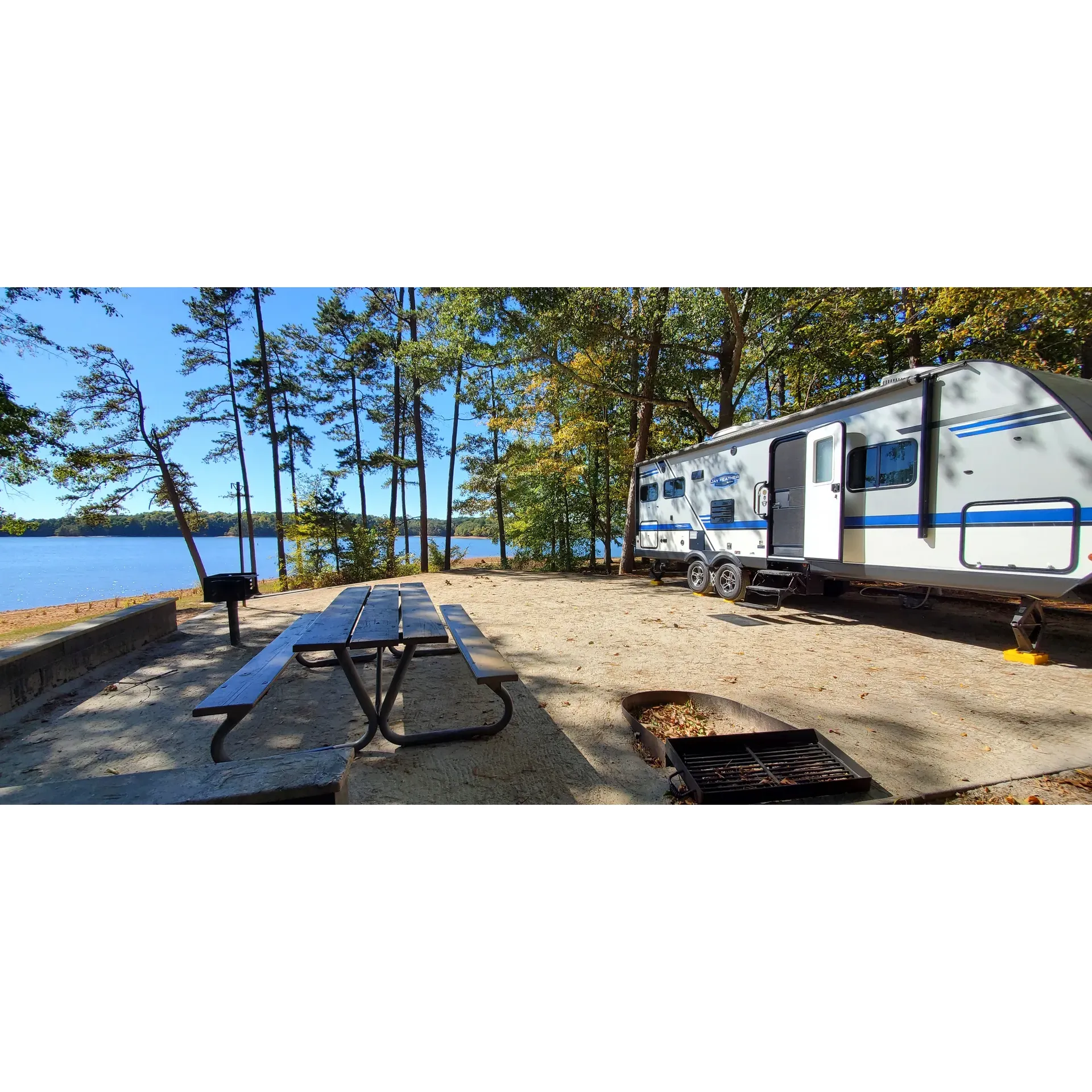 Twin Lakes Campground #33 presents an inviting retreat for campers looking for a harmonious blend of outdoor fun and serene lakeside relaxation. The spacious campsites offer ample room for visitors to unwind without feeling crowded, maintaining a personal haven amidst the natural splendor. Accompanying these well-appointed camping spots is the exclusive swimming area designated for overnight guests, ensuring a private and leisurely dip in the lake's refreshing waters.

For those seeking a short escape into nature, the picnic area provides two additional swimming zones, each delineated with vibrant yellow floating barriers for safety and easy spotting. The consistent praise from guests underscores the campground's allure, with many citing it as a newfound favorite destination for its outstanding facilities.

Friendly and hospitable staff enhance the camping experience, ensuring each visit is comfortable and welcoming. The meticulously maintained campsites, many with captivating lakefront views or scenic vistas, provide an idyllic backdrop for any outdoor adventure. The cleanliness extends to the on-site bathrooms, which are frequently lauded for their impeccable condition.

Family and friends can gather with ease, as each site accommodates multiple vehicles and offers day passes for those wishing to partake in the day's festivities without an overnight stay. Embracing a family-friendly atmosphere, Twin Lakes Campground #33 is an idyllic setting where memories are made by the lakeside, with exceptional kindness from the gate operators contributing to an atmosphere of warmth and community.

Enjoyment at the campground is further enriched by its semi-remote location, striking the perfect balance between seclusion and convenience. A stone's throw from downtown Clemson and Anderson, visitors have quick access to local amenities, including shops for groceries and other essentials. The grounds themselves boast well-preserved sites, featuring level, hard-packed gravel and high-quality utilities that are conscientiously looked after.

Twin Lakes Campplementary is a haven for those who cherish variety, offering a host of prime locations that make any stay feel special. A favorite for families, including adults, children, and even the furry four-legged members, the campground provides the perfect setting for enjoying time on the water, socializing with loved ones, and taking in the spectacular surroundings. Whether arriving with a pontoon for a tranquil cruise or simply seeking a restful lakeside retreat, Twin Lakes Campground #33 awaits with open arms, ready to play host to your next cherished outdoor excursion. Description by ChatGPT.