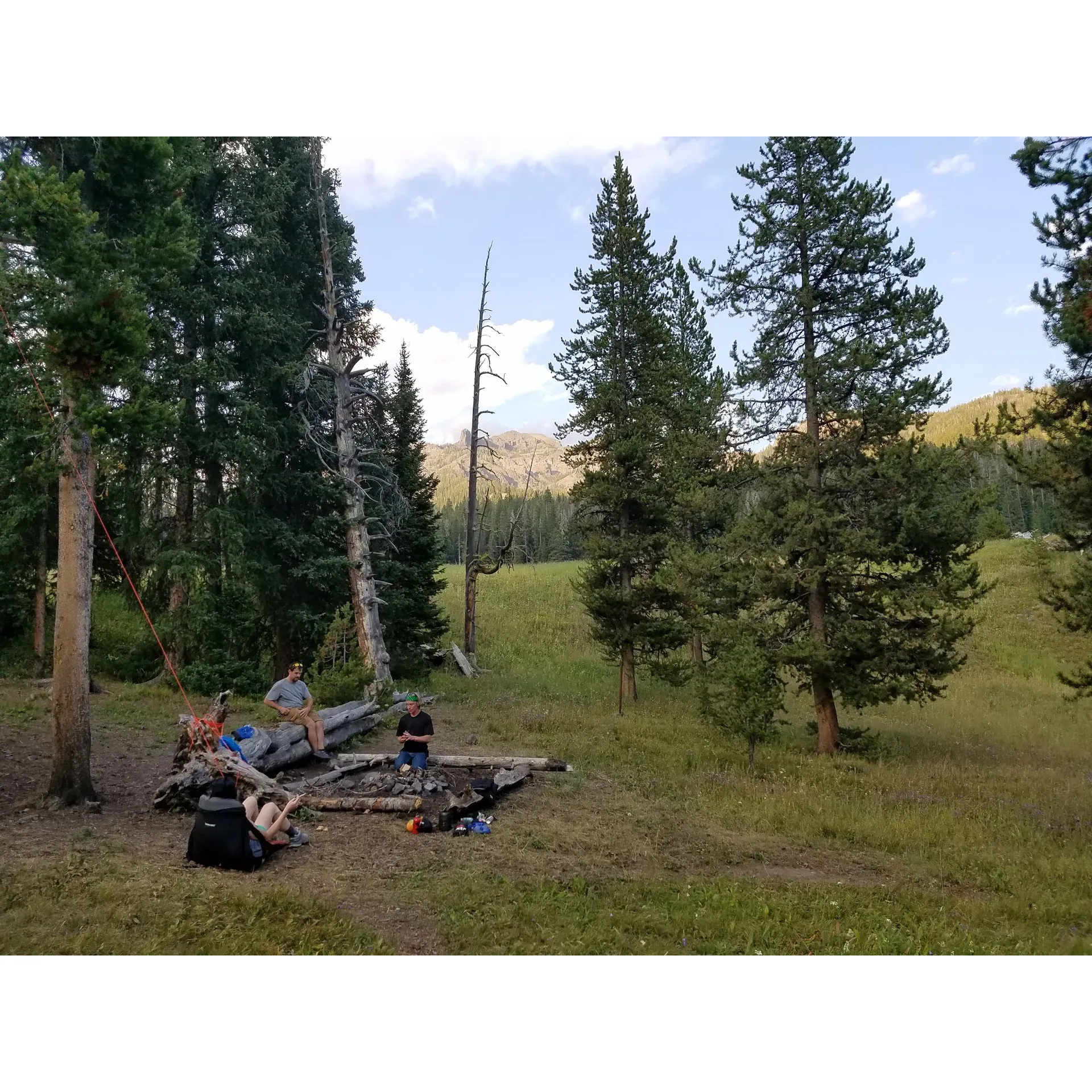 Pebble Creek 3P1 emerges as a gem within the majestic Lamar Valley, praised as a favorite among travelers. The backpacking site boasts excellent maintenance and clear ground, inviting adventurers to set up their tents with ease. The meticulous organization of the site is evident, with the tent area thoughtfully positioned near the cooking zone for convenience. Visitors are treated to the serene ambiance of the nearby creek, offering a refreshing supply of cool, natural water ideal for rehydrating after a day's trek. For those cherishing the rustic warmth, the site permits campfires, a perfect complement to the outdoor experience under the stars. Its reputation for a repeat visit speaks to the site's allure as a sought-after destination for outdoor enthusiasts. Description by ChatGPT.