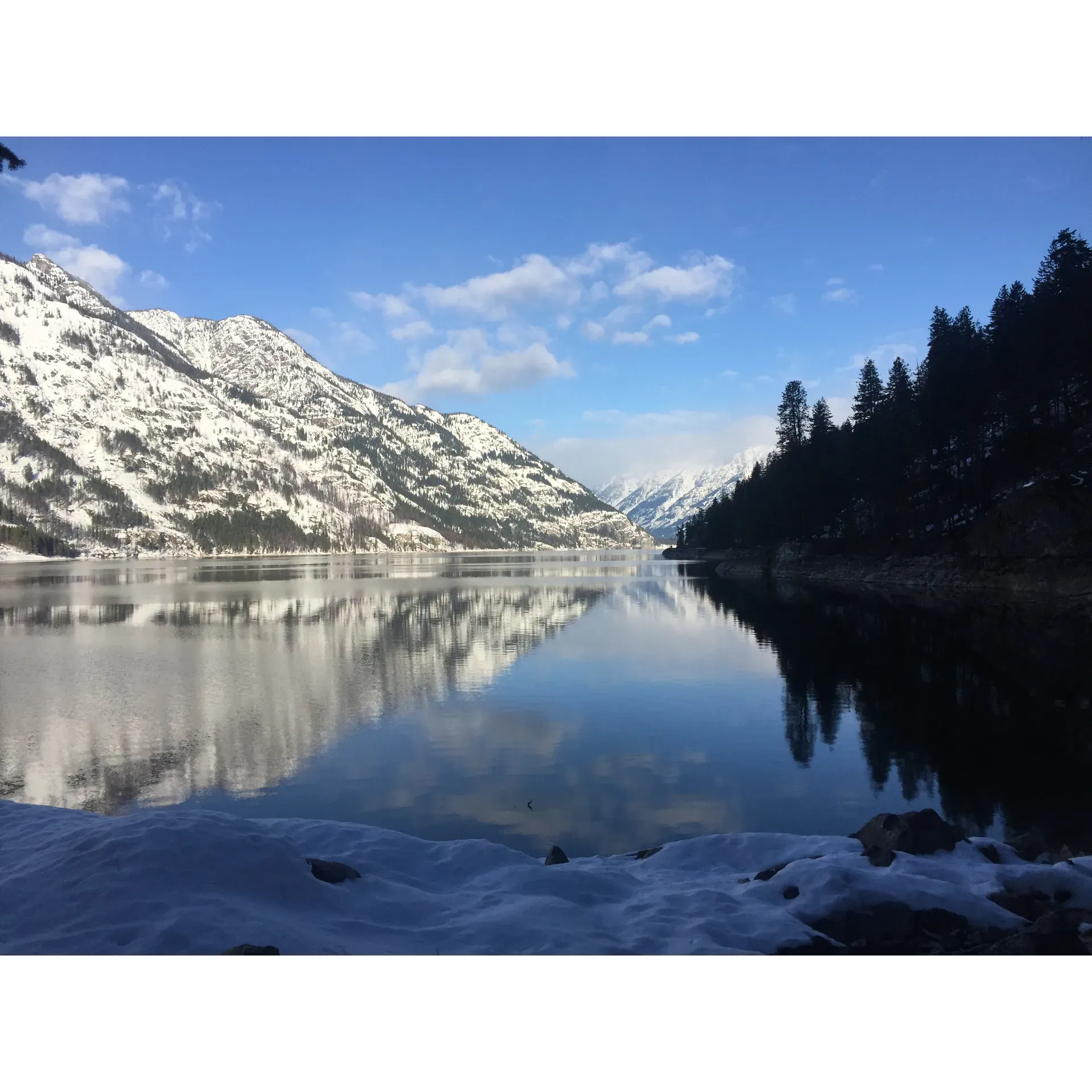 Flick Creek Campground offers an idyllic escape for outdoor enthusiasts and nature lovers alike. Tucked away just a leisurely hike from the charming community of Stehekin, guests have the privilege of immersing themselves in delightful scenery with stunning views of the encompassing landscape stretching up and down the tranquil lake. 

As daylight unfolds, visitors can experience the invigorating mountain breeze that sweeps through the area, adding a refreshing touch to the warm afternoons. The campground is well-equipped, ensuring a comfortable and worry-free stay. With amenities including bear-proof storage boxes, guests can rest easy, keeping their food safe while maintaining the natural habitat of the local wildlife.

In addition to its convenient location and natural beauty, the Flick Prescott Campground boasts a dock, providing direct water access for those looking to explore the lake’s serene offerings by boat or simply relax by the water's edge. This feature stands out as a highlight, offering a unique vantage point to admire the expanse of the lake and its soothing qualities.

Overall, Flick Creek Campground presents a superior choice for campers seeking peace, captivating landscapes, and a touch of adventure—all encapsulated in a picturesque outdoor setting. Description by ChatGPT.