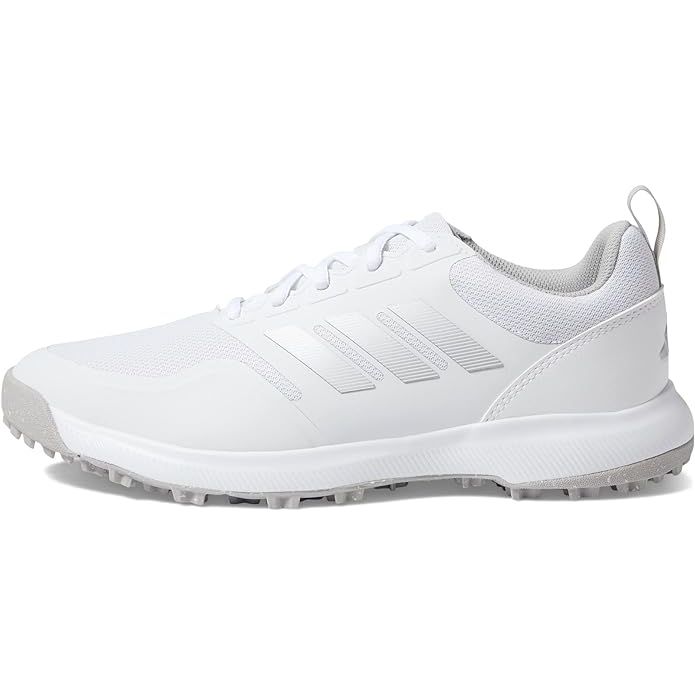 The adidas Women's Tech Response Spikeless 3.0 Golf Shoes are designed for optimal performance on the course while providing comfort and style. These shoes feature a lightweight and breathable mesh upper that keeps your feet cool during long rounds of golf.