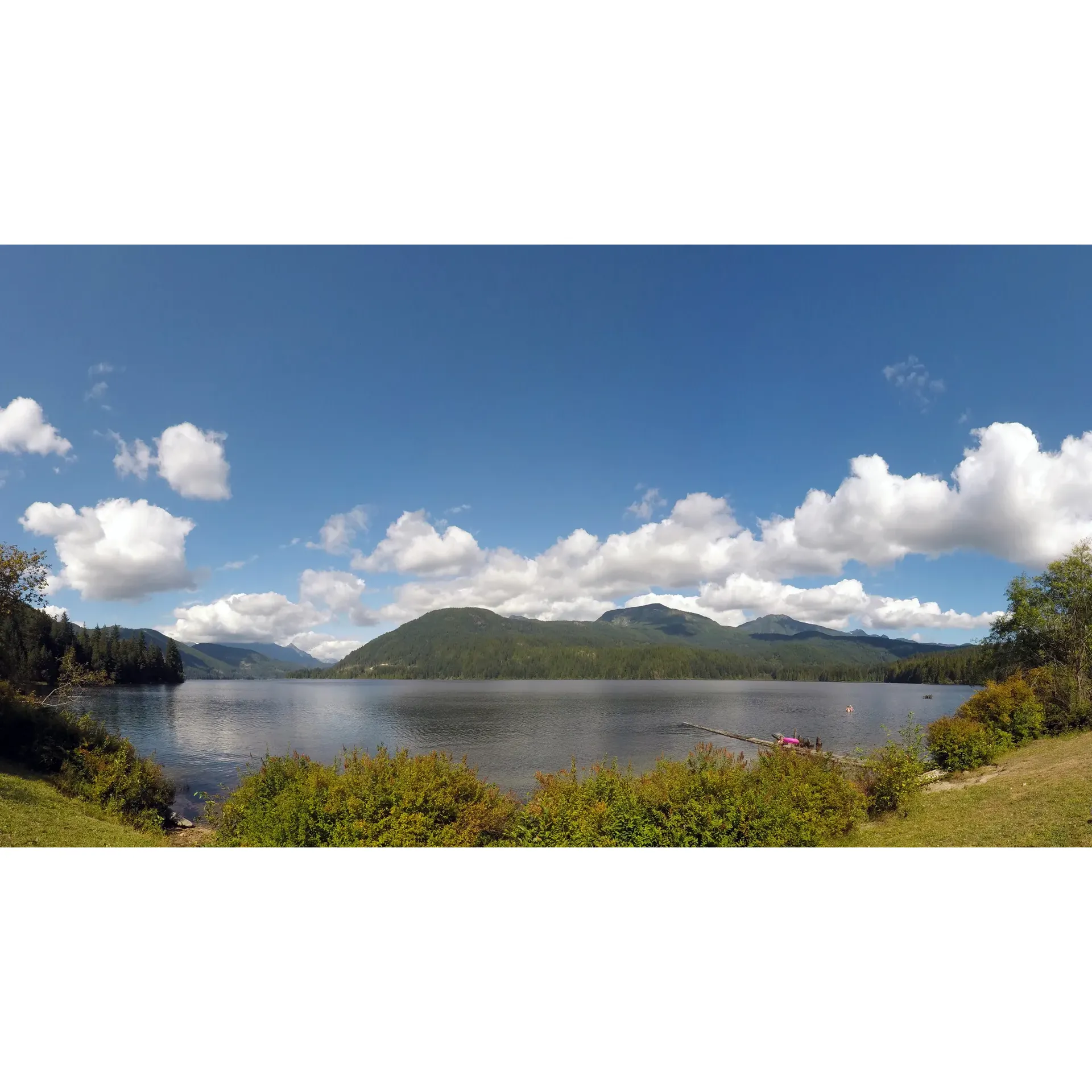 Dodd Lake is a serene and picturesque destination that provides a harmonious blend of aquatic bliss and outdoor activities for visitors from all walks of life. Boasting a picturesque setting, the lake's flat calm waters are perfect for tranquil days, with the stunning mirror reflections of the surrounding verdant forests, majestic mountains, and clear sunny skies contributing to the spectacular views that can be enjoyed from the shore or while gently cruising on a boat.

A true gem for outdoor enthusiasts, the site features lush, grassy sites that offer a refreshing and comfortable alternative to traditional dirt camping. The facilities include a boat launch area, accompanied by a charming, albeit rustic, dock, which leads onto a delightful little beach area that invites families and friends to relax and enjoy the natural beauty.

The welcoming environment is additionally ideal for those who relish time spent with their furry friends, with dogs finding their own slice of paradise under the open sky. Meanwhile, the fire pit serves as a social hub for friendly gatherings, where you can partake in the simple joys of an outdoor weiner roast, sharing stories and laughter as the night sky unfolds.

Dodd Lake’s camping offerings cater to a variety of preferences, with campsites that come in different sizes to accommodate anything from a cozy tent for two to larger travel trailers for group adventures. It's a place where time seems to stand still, seducing visitors to extend their stay and immerse themselves in the peaceful atmosphere.

Outdoor activities are plentiful, with trails that beckon hikers to explore and provincial reg-regulated fishing that promises a serene yet exciting experience for anglers. As the seasons shift, spring camping emerges as a much-anticipated activity, while summer brings children alive with joy and excitement, making it an idyllic retreat for family vacations.

Whether looking for a peaceful retreat or active recreation, friendly encounters and an enchanting natural landscape await at Dodd Lake, a destination that promises cherished memories and the allure of returning again and again. Description by ChatGPT.