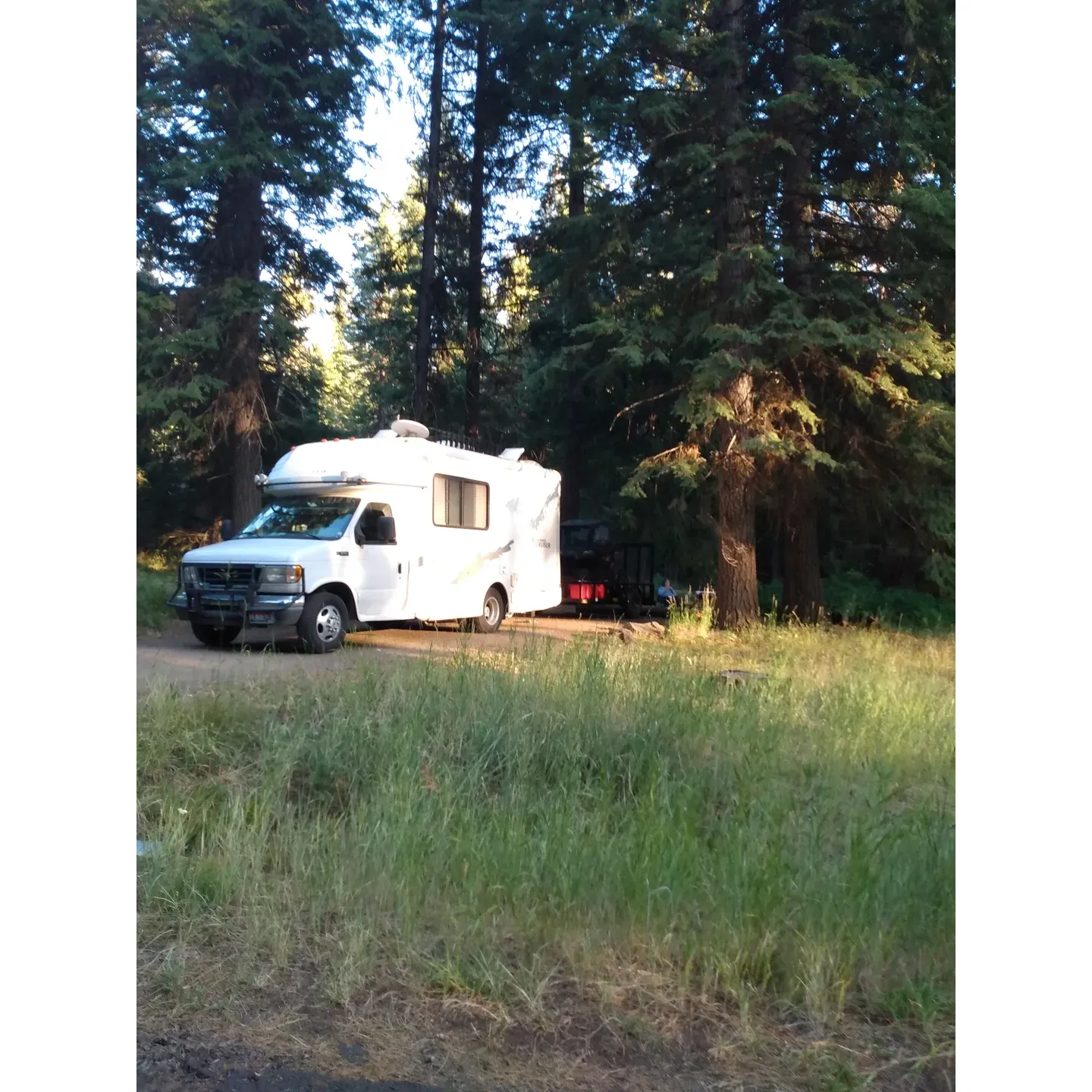 Ochoco Divide Campground offers a serene and well-maintained outdoor haven ideal for both nature enthusiasts and casual travelers looking to escape into the beauty of the Ochoco National Forest. Whether you choose to relax at site 23 or any of the campground's variably sized plots, you'll find plenty of room for different comforts – from cozy tents to more substantial RVs, including ample space for a 32-foot vehicle.

The campground's elevation at just over 4,700 feet provides breathtaking scenery, encompassed by a diverse array of trees like ponderosa pines, white pines, firs, and various deciduous species. Though the past whispers its presence with evidence of a bygone fire, the forest's resilience and charm remain unblemished, offering a stunning backdrop for your stay.

Guests delight in the friendly presence of an on-site host, whose dedication to safety and cleanliness ensures a worry-free experience. The bathrooms receive high praise for their spotlessness, adding a touch of comfort to the rustic charm. While the campground takes pride in its tranquility, the occasional sounds of local wildlife and vehicles remind you of the accessibility of this mountain retreat.

With clear skies providing an awe-inspiring canvas for stargazing, the Ochoco Divide Campground becomes a nighttime wonder, with brilliantly twinkling stars as the prime attraction. Affordability is not forgotten – at $20 per night with generous pass discounts available, the value offered is as clear as the starlit sky.

For the adventurous, nearby attractions like the John Day Fossil Beds National Monument offer a glimpse into the Earth's ancient history, just a drive away. And, for those who appreciate an off-the-grid experience, the dry camping setup with pit toilets caters to a more traditional camping ethos, allowing guests to truly disconnect and immerse themselves in the surrounding natural splendor.

Ochoco Divide Campground is not just a destination, but an invitation to explore, relax, and create unforgettable memories in the timeless beauty of Oregon's high desert forests. Description by ChatGPT.