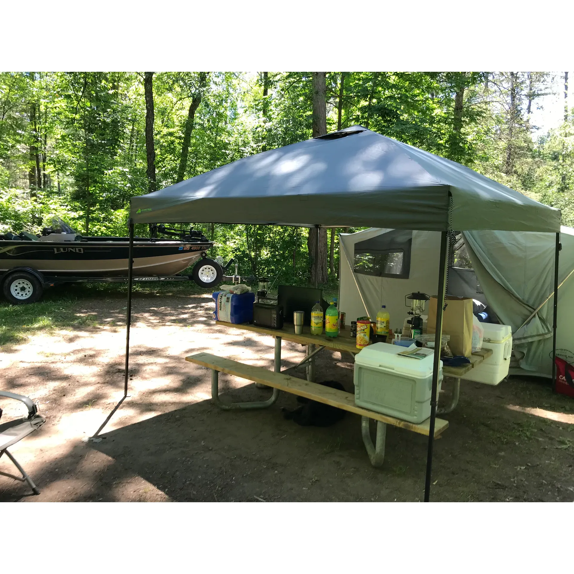 Discover a serene hideaway in the heart of a lush forest at Chipmunk Rapids Campground, a tranquil retreat for nature lovers and outdoor enthusiasts alike. This quaint campground is a treasure for those seeking simplicity and an escape from the digital world, offering a rare chance to disconnect as it boasts zero cellphone coverage from carriers like Verizon - a true opportunity for uninterrupted serenity.

Guests delight in the campground's ample freshwater sources, drawing pure enjoyment from an artesian well and a spring of glacial water celebrated for its refreshing taste. Visitors are encouraged to bring bottles to capture this crisp, natural refreshment, a highlight for any camper.

The campsites, praised for their generous spacing, afford guests a sense of openness and ease of access, all while maintaining a connection with the surrounding wilderness. Each site is a haven equipped with amenities to enhance the outdoor experience, featuring a fire pit with a grill, a picnic table, and a well-maintained pit toilet.

A gentle river path beckons campers for leisurely strolls, leading to a picturesque river that offers not just scenic views, but also the joys of fishing and the bliss of watching local wildlife in its natural habitat. Here, one can witness majestic eagles soaring overhead, partake in a fish fry with the day's catch, or observe the charming antics of birds and ducks.

The campground embraces the spirit of rustic living while providing comfortable flat sites adorned with new gravel. An easy registration process and affordability at only $15 per night allow for a hassle-free experience, making it an accessible getaway for all.

Chipmunk Rapids Campground has a long-standing reputation for idyllic escapes, with some returning for over 35 years to bask in its offerings. It presents itself not as a glamping site but as an authentic camping experience that brings one closer to the great outdoors. Whether you're settling in for a tranquil retreat or embarking on a fishing adventure, this spot invites you to relax, rejuvenate, and reconnect with nature's simple pleasures. Description by ChatGPT.