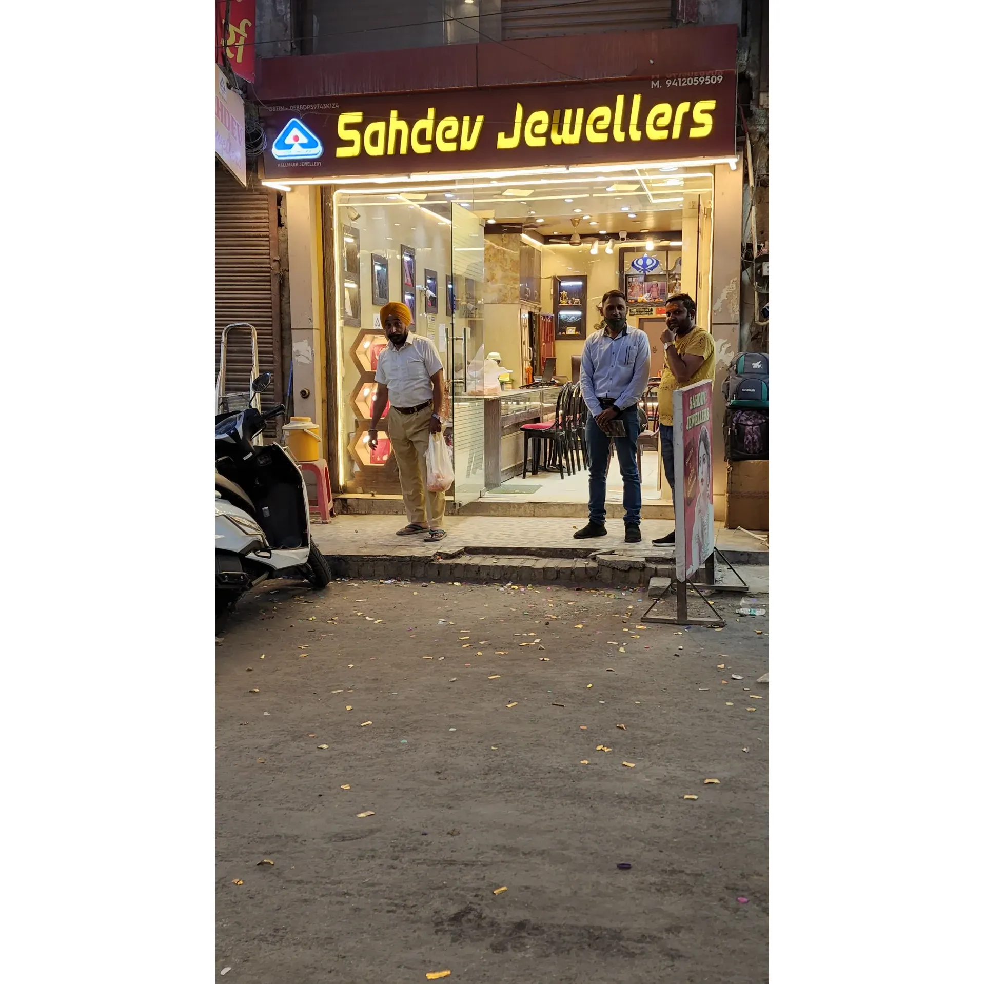 Sahdev Jewellers has emerged as the epitome of elegance and trusted craftsmanship in Dehradun. For more than seven decades, they have curated a trove of magnificent jewelry pieces, catering to an array of tastes and occasions. Renowned for their fine selection, they are the go-to destination for anyone looking to indulge in the luxury of gold, the luster of silver, or the brilliance of diamonds.

Customer satisfaction is at the heart of Sahdev Jewellers, and it’s evident in the personalized service they offer. Patrons are consistently captivated by the extensive and unique collection available, whether they are seeking traditional designs that resonate with cultural heritage or contemporary pieces that suit modern sensibilities. Sahdev Jewellers' passion for creating and providing the best quality jewelry shines as bright as the hallmarked creations they showcase.

Not just purveyors of beauty, Sahdev Jewellers also extends a reliable and honest service for clients looking to exchange their previously cherished possessions for cash. They are praised for the best rates and transparent dealings, ensuring every transaction is as shiny and clean as their jewels. For any purchase or exchange, customers can rely on their expert advice, ensuring the best value and satisfaction.

The showroom itself is a space of comfort and positivity, where clients are met with smiles and treated with the utmost respect. Every visit is personalized, every choice respected, and every service rendered with a touch of warmth, making it feel like a family affair.

With a vibrant history of trust, unparalleled service, and an exquisite selection of jewelry, Sahdev Jewellers stands proudly as one of Dehradun's most esteemed jewelry destinations. Their commitment extends from the sparkle of each gem to the eyes of their customers, making it the perfect place not only to acquire new treasures but to create lasting memories. Description by ChatGPT.