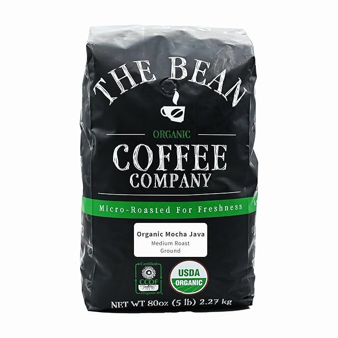 The Bean Organic Coffee Company Mocha Java is a medium roast, ground coffee that is available in a 5-pound bag. This coffee is made with organic beans, ensuring a high-quality and environmentally friendly product. The Mocha Java blend is known for its rich and bold flavor profile, with hints of chocolate and a smooth finish.