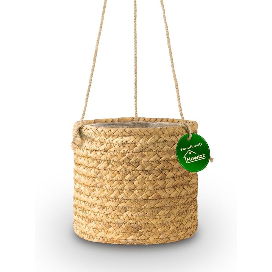 The Handwoven Seagrass Indoor Hanging Planter Basket is a stylish and practical way to display your favorite indoor plants. This hanging planter is handwoven from seagrass, making it both durable and elegant. The natural fibers of the seagrass add a touch of bohemian charm to any room.