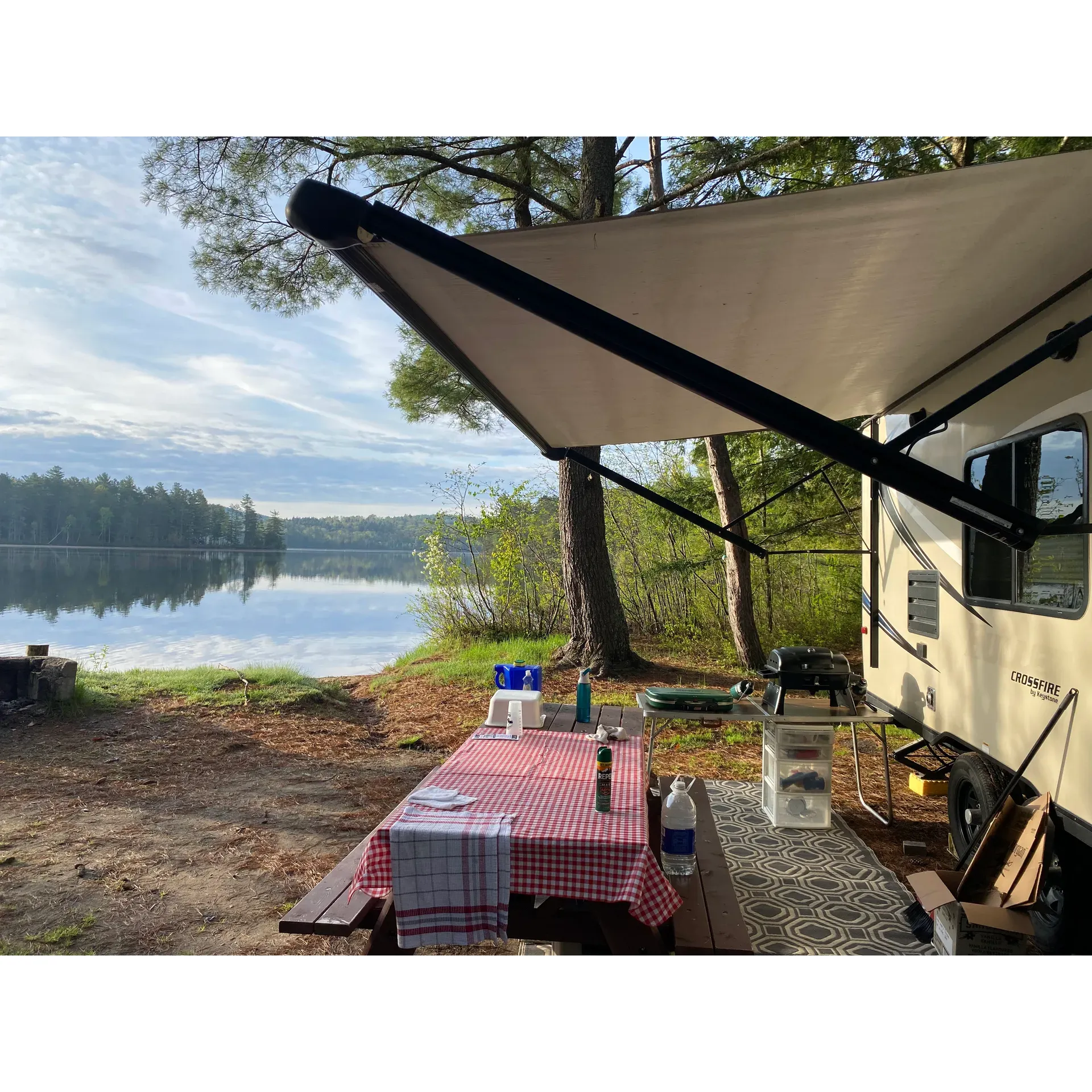 Fish Creek Pond Campground offers a serene retreat into nature that has been cherished by visitors for over half a century. As a favored destination for those seeking tranquility and the beauty of the outdoors, this campground provides an idyllic escape for both long-time enthusiasts and new adventurers alike. With waterfront sites like the much-applauded site #84, campers can enjoy the calming views of the lake, accompanied by the melodic calls of loons and spectacular sunsets that paint the sky.

The experience here is rooted in the simplicity and charm of traditional camping. Campers can enjoy the gentle sounds of water and wildlife from their spacious lots, most of which afford direct water access perfect for small boats, canoes, and kayaks. While the lack of electricity underscores the campground's commitment to an authentic outdoor experience, convenient amenities such as indoor plumbing and clean restrooms with cold water ensure a comfortable stay. The family-friendly aspects aren't overlooked, thanks to a well-maintained playground and a beautiful beach perfect for little ones to play and splash around.

For those with larger camping vehicles, the campground accommodates with an array of sites suitable for everything from tents to 40-foot motor homes or trailers, although there are no sewer, water, or electric hookups, preserving the natural charm of the surroundings. Additionally, the proximity to scenic towns like Lake Placid and Saranac Lake allows for easy day trips and exploration of the local area.

The staff at Fish Creek Pond Campground, including diligent rangers, are noted for ensuring a safe and enjoyable environment, promptly addressing any concerns and contributing to the peaceful atmosphere that guests appreciate. Advance planning is advised to secure a spot in this popular haven that combines the allure of pristine wilderness with the joys of a family-friendly campground. Whether seeking a quiet retreat or an opportunity to create cherished memories with loved look no further than Fish Creek Pond Campground, a place where the spirit of traditional camping is alive and well. Description by ChatGPT.