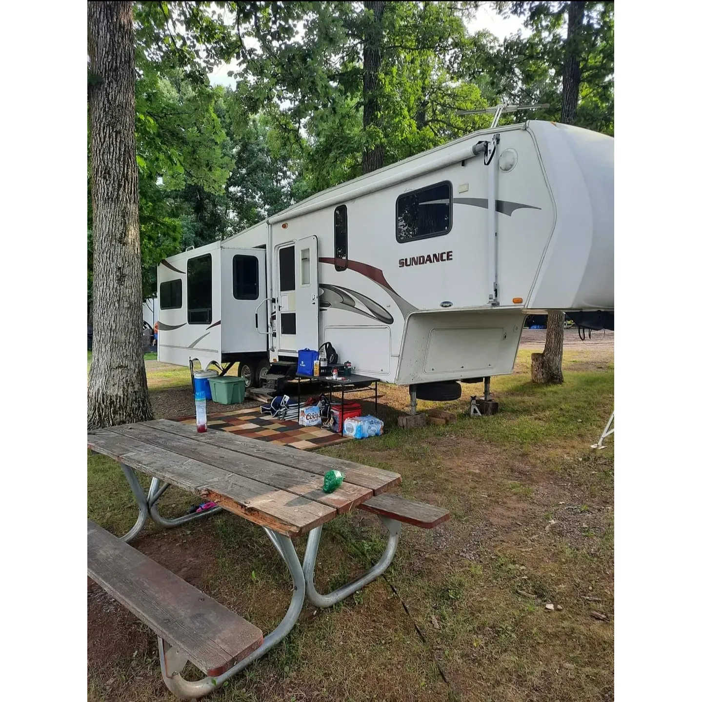 Bear Lake Park Campground offers a tranquil escape for outdoor enthusiasts and camping connoisseurs alike. This picturesque destination provides guests with waterfront sites, allowing for serene views and direct access to the lake's peaceful shores. It's a favored stop for many travelers due to its cozy atmosphere and the attentive hospitality provided by the very nice owner couple that manages the property.

The campground provides essential amenities, including a well-maintained dump station, water, and 120v electric hook-ups to ensure a comfortable stay. Despite its modest size, this place boasts a quaint charm that captivates visitors. Moreover, the dedication to improving the campground is evident, with investments being made to enhance the guest experience.

Outdoor activities are abundant, with the scenery setting the stage for a memorable camping trip. While it's a more suitable retreat for those without children, it offers a sense of tranquility and an opportunity for adults to enjoy a peaceful environment. Guests can appreciate the beauty of their surroundings and the wildlife that inhabits the area.

For those seeking a small, beautiful campground that offers both essential conveniences and the allure of the great outdoors, Bear Thank Lake Park Campground is a gem that promises a delightful and restorative camping experience. Description by ChatGPT.