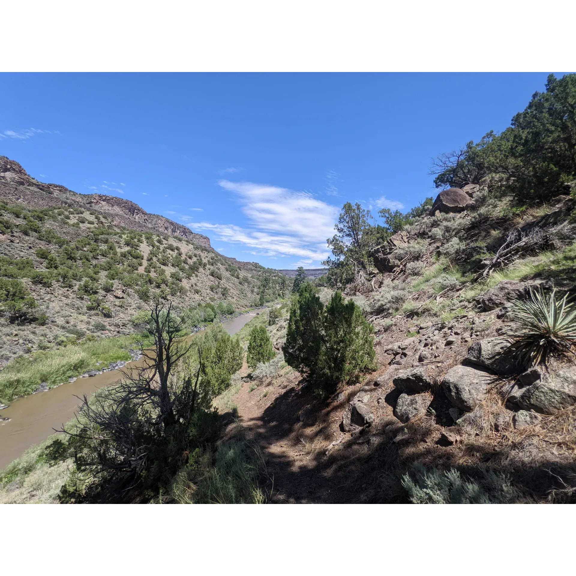 Cebolla Mesa Campground represents a tranquil outdoor oasis, perfect for seasoned hikers and nature enthusiasts seeking both adventure and solace. The trails offer a rewarding experience for those equipped with stamina and balance, leading to the stunning convergence of Red River and the Rio Grande. A walking stick is a helpful companion on these trails to assist with the ascent and enhance stability.

Access to the campground requires a vehicle with some clearance due to the rugged terrain, but the journey rewards visitors with breathtaking scenery and a sense of escape from the hustle and bustle of daily life. The availability of amenities such as clean pit toilets, tables, and fire pits ensures a comfortable and rustic camping experience.

Visitors will appreciate the spacious and well-situated campsites that provide unobstructed views of the surrounding canyon and river landscapes. Early risers and sunset chasers are treated to spectacular views that accentuate the campground's scenic charm. While the road may present challenges for larger RVs, those with smaller trailers find it a perfect fit, adding a cozy and intimate dimension to the camping adventure.

Cebolla Mesa Campground is ideal for anyone with an appreciation for remote natural settings. Its blend of rugged beauty, hiking trails rich with cultural history like ancient petroglyphs, and the tranquility found in its seldom crowded spaces make it an unforgettable destination for a serene escape. Description by ChatGPT.