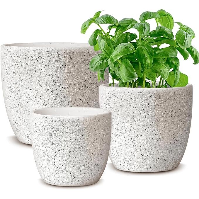 The Ceramic Plant Pots Set of 3 is a set of modern and decorative plant pots that come in three sizes: 5.5, 4.9, and 3.8 inches. Each pot features a drainage hole at the bottom, making it ideal for both indoor and outdoor use to prevent waterlogging and promote healthy plant growth.