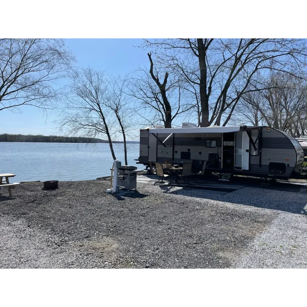 River Pointe Campground & Marina emerges as a cherished retreat for both adventurous campers and those seeking a serene getaway. With glowing reviews highlighting its immaculate grounds and hospitable atmosphere, this destination promises a clean and welcoming environment for all its visitors.

Visitors often speak of the stunning scenery that serves as a picturesque backdrop for both camping excursions and longer-term stays. The draw of tranquility is so strong that some guests have decided to make River Pointe their permanent residence, opting for cozy cabins that are just steps away from the soothing early morning sights.

Repeatedly praised for the warm and amiable staff, particularly the commendable hospitality shown by Rick, guests feel immediately at home. This personal touch imbues each stay with a sense of camaraderie and community that beckons visitors back time and again.

A hub for relaxation and enjoyment, River Pointe offers an array of amenities designed to enhance the outdoor experience. Seasonal camping is a delightful draw, with the availability from mid-April through October presenting an escape for those looking to immeride themselves in nature. A swimming pool invites guests to bask in leisure, while boat slips are available for rent to nautical enthusiasts eager to journey along the river.

The campground is not only a place to unwind but also a social nexus where new friendships are forged amid the great outdoors. The harmonious blend of nature with friendly faces makes for an idyllic setting where treasured memories are created. Happy visitors are already expressing excitement for future seasons, affirming the exceptional efforts of new management and the welcoming spirit they have cultivated at River Pointe Campground & Marina. Description by ChatGPT.