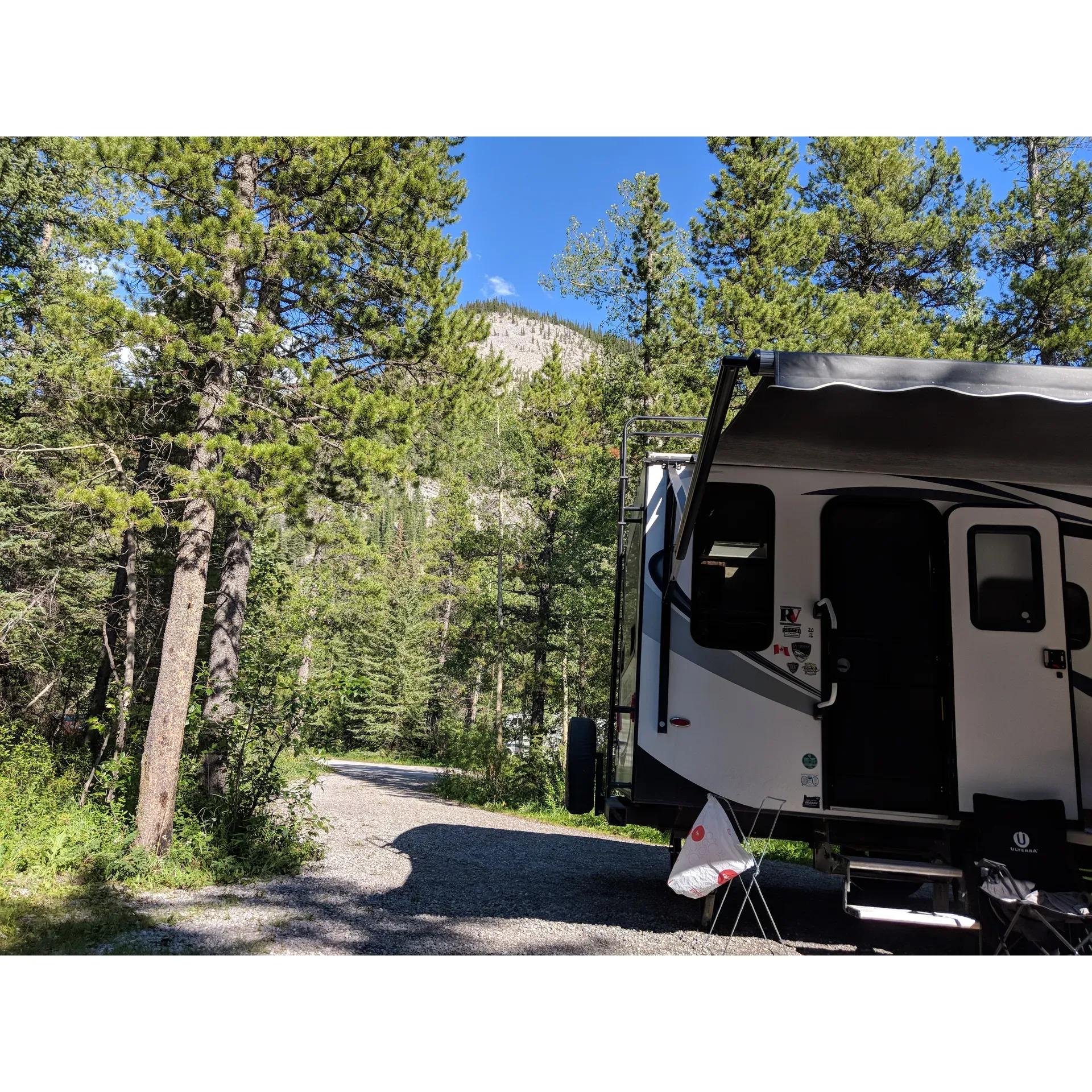 Immersed in the scenic beauty of Kananaskis Country, Beaver Flat Campground shines as an exceptional outdoor destination for both avid nature lovers and families alike. Boasting some of the region's most impeccable facilities, the campground is celebrated for its pristine washrooms, embellished charmingly with hanging flower pots, setting a standard of cleanliness and attention to detail that is unmatched.

Visitors are enchanted by the tranquil ambiance along the river, where the gentle current babbles and the wilderness thrives. Here, privacy is paramount, with spacious, well-treed sites offering a secluded retreat from the hustle of everyday life. The grounds are meticulously maintained, ensuring each visitor arrives to a spotless campsite ready to become their home away from home.

A delightful array of beaver dams can be spotted in the area, serving as a testament to the untouched natural environment and providing unique educational encounters for all ages. The campgrounds are enhanced by the warm and polite camp hosts, who are not only helpful in providing essentials like firewood but also contribute to the welcoming and enjoyable experience.

For those seeking tranquility, Beaver Flat Campground is a haven of peace, where the serene surroundings are punctuated by the soft whispers of nature. The sprawling spaces between campsites afford ample room for relaxation, and a selection of riverside spots offers a front-row seat to the mesmerizing Elbow River. Essentials such as clean toilets and firewood availability add convenience, while the no-hookup, ‘first-come, first-served’ ethos maintains the naturalistic charm.

Outdoor enthusiasts have plenty to discover, from the comforting shade of forest trails to the exceptional hiking paths on Moose Mountain, each promising an invigorating adventure. The Beaver Flat trail is notably alluring, ideal for a family stroll and punctuated by the industrious work of local beavers.

Visits to Beaver Flat Campground are often accompanied by awe-inspiring moments where nature's splendors are on full display, crafting memories that encourage many to return year after year. Whether you're setting out alone, with friends, or with family, this campground offers a richly rewarding outdoor escape, illustrating the serene beauty that Kananaskis Country has to offer. Description by ChatGPT.