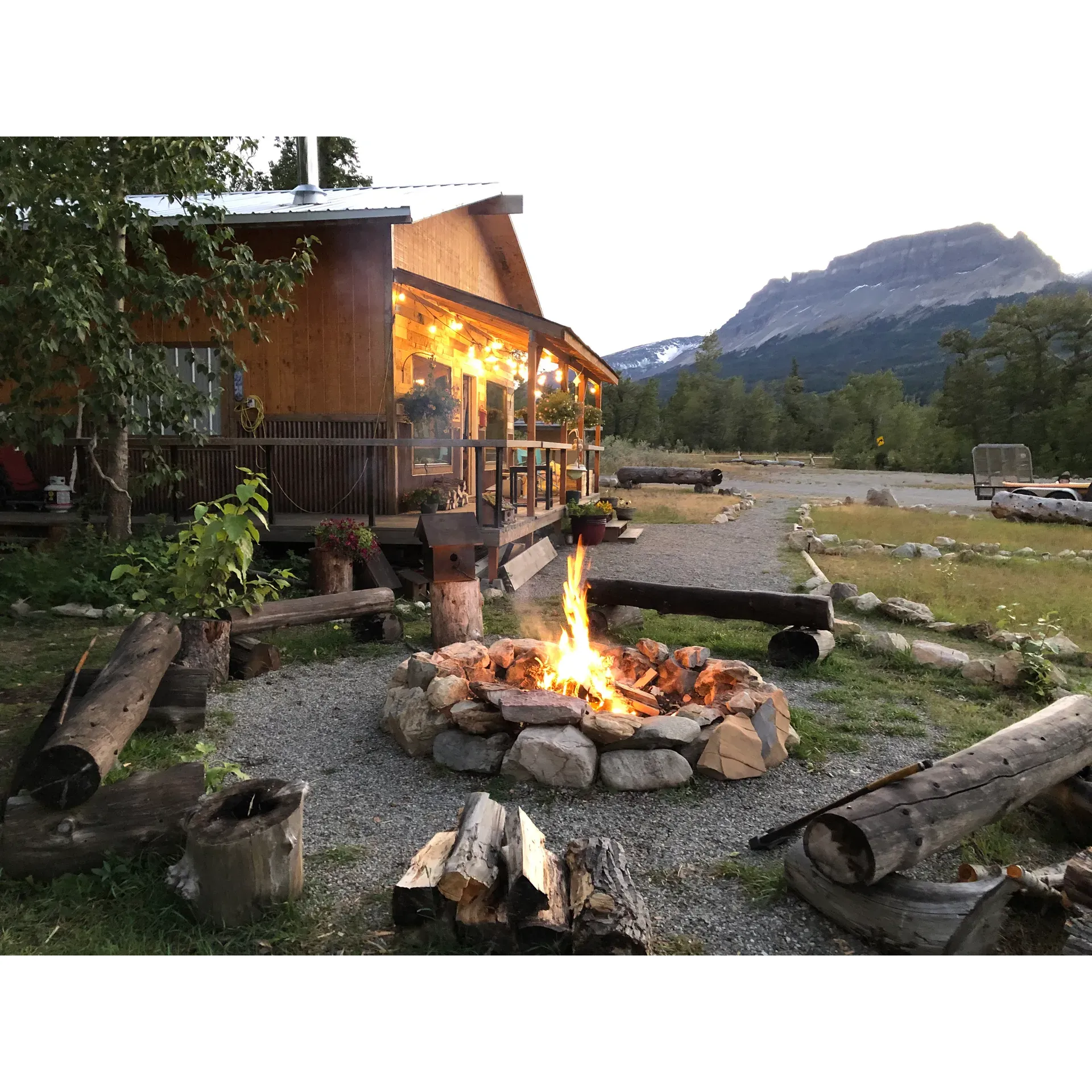 Divide Creek Campground offers a serene and memorable outdoor experience for individuals and families alike. Visitors are greeted with the warm hospitality of a family-owned and operated campground, ensuring that each stay is both personable and enjoyable. Guests commend the cleanliness of the facilities, including well-maintained pit toilets and, once opened for the season, spotless showers equipped with hot water to refresh after a day of exploring.

Located in close proximity to the wonders of Glacier National Park, the campground serves as an ideal base camp. Just steps away, the St. Mary River enchants with its crystal-clear waters, offering idyllic swimming holes that captivate both young and old, fostering endless hours of aquatic play and relaxation amidst nature's backdrop.

The campsites at Divide Creek provide a back-to-basics experience, with dry sites that encourage a more authentic connection with the surrounding environment. However, the necessities are well provided for, with water available for guests to fill containers for personal or RV use. Guests can also revel in simple pleasures such as gathering their own firewood on-site, stargazing under the brilliant night sky, or joining in the community spirit around the campfire.

Nature enthusiasts will appreciate the informative nature trail encircling the campground, where one can learn about the local flora and fauna. Friendly insiders, namely owners Matt and Veronica, enhance the visit with their treasure trove of tips and insights about Glacier, the local community, and hidden gems to explore, like the Grinnel Glacier hike.

Despite the rule of early evening quiet hours for generators, visitors find the peace and calm that ensue to be conducive to an immersive experience in Montana's great outdoors. The campground's convenient location also means short drives to significant landmarks such as St. Mary’s Visitor Center, the Lake, the Falls, and the east side of the iconic Going-to-the-Sun Road.

Family-friendly, dog-welcoming, and offering exceptional value, Divide Creek Campground is celebrated as a highlight of Montana adventures, with many guests eagerly planning their return to this little slice of paradise. Description by ChatGPT.