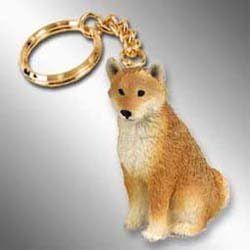 A Shiba Inu keychain is a small accessory that represents the popular Japanese breed of dog, the Shiba Inu. These keychains typically feature a small replica of a Shiba Inu made from materials such as plastic, metal, or plush.