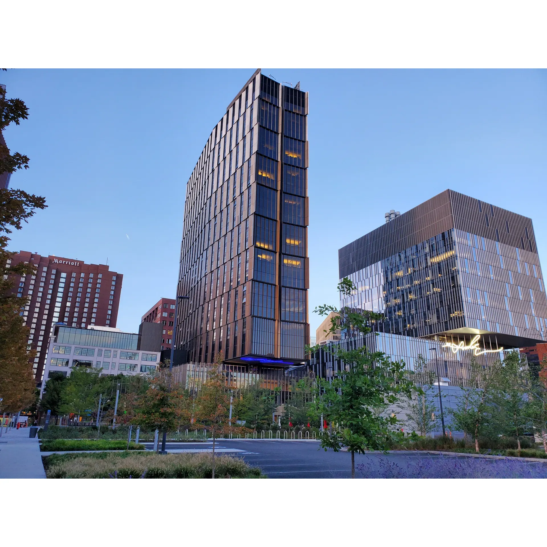 Graduate Tower at Site 4 is a vibrant hub offering a blend of convenience, community, and comfort to its residents. Strategically positioned in an area renowned for its safety and life after dark, the community enjoys the benefit of a T-stop immediately adjacent to the building, facilitating effortless access to public transportation.

Those affiliated with MIT find the location exceptionally advantageous. Academic offices and the MIT Medical facility are a mere stone's throw away, with a brisk 10-minute walk connecting residents to the heart of campus life. Further enhancing the residential experience are the coveted amenities exclusively available for those living in MIT housing, including complimentary yoga sessions and convivial weekly coffee gatherings—perfect for breaking the ice with neighbors and weaving social threads within the community.

The spirit of Graduate Tower is encapsulated in the Open Space Programming events that unfold right outside one's front door, offering a slate of activities that deliver both entertainment and opportunities for engagement. Resident-led events foster a sense of camaraderie and community, with plans in place for an increasingly robust calendar under the dedicated guidance of the residence committee.

Residents stepping into Graduate Tower find more than just a living space; they discover an environment where friendships blossom and academic pursuits are supported by a wealth of resources and a congenial living situation. For those seeking an all-encompassing residential solution within touching distance of MIT, Graduate Tower is an exceptional choice, balancing urban convenience with a warm and welcoming residential community. Description by ChatGPT.