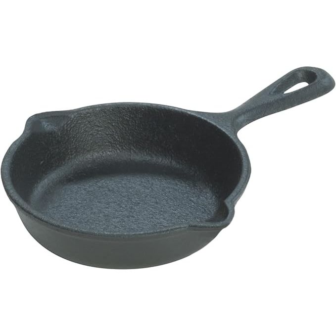 The Lodge LMS3 3.5-Inch Logic Miniature Skillet is a small, versatile cookware piece that embodies the durability and heat retention properties of traditional cast iron. With a compact 3.