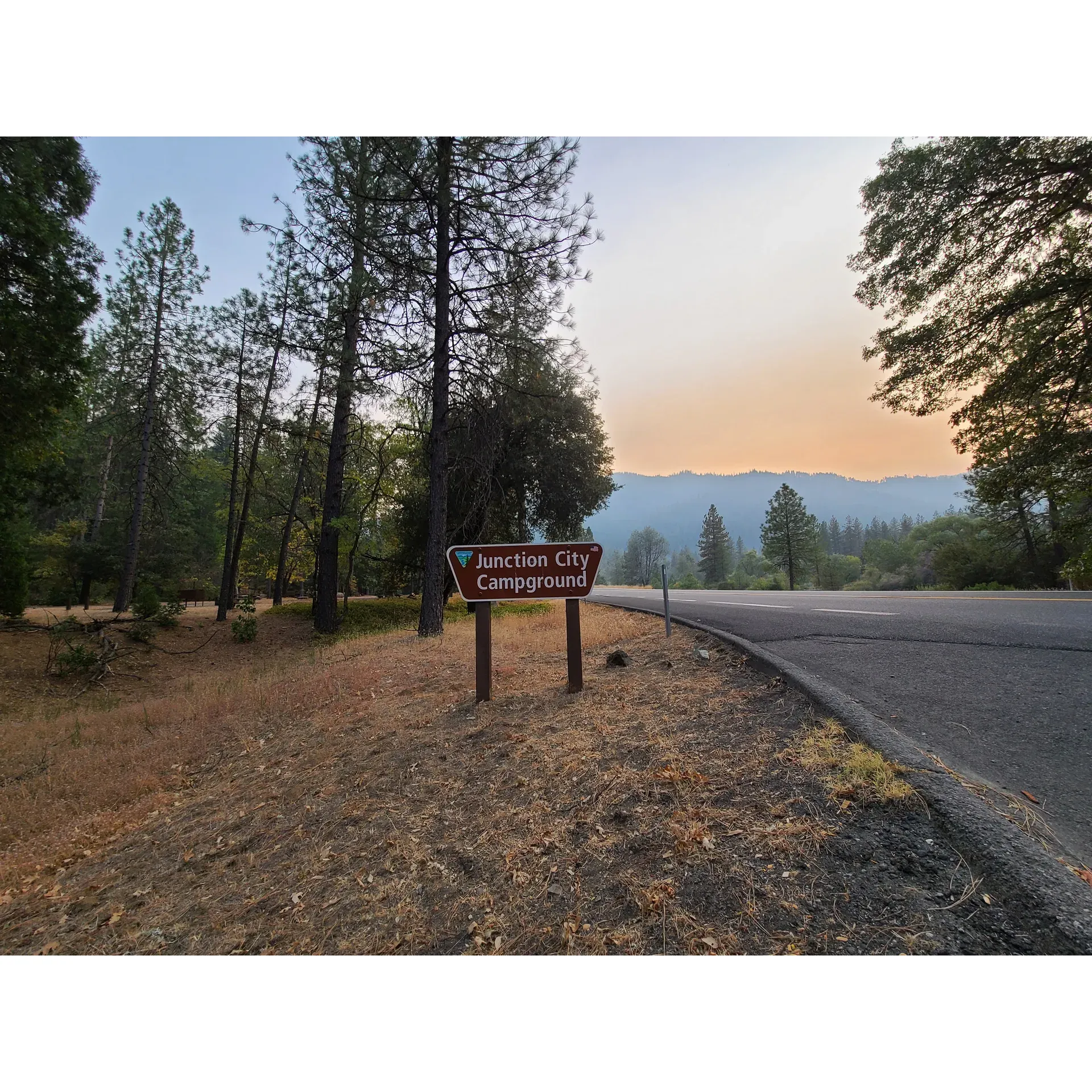 Junction City Campground offers an inviting outdoor experience for campers looking for an ideal retreat with the convenience of easy access. The spacious campground features generously sized sites, providing ample room for your tent, RV, or lounging by the large fire pits. While conveniently located on Highway 299, the campground maintains a sense of seclusion, ensuring a private and peaceful environment surrounded by the beauty of nature.

The campground prides itself on immaculate upkeep, where a dedicated host ensures that the grounds are pristine and welcoming. The host's attentive yet respectful oversight guarantees a tranquil stay, and guests can expect exceptional hospitality throughout their visit, especially highlighted during the bustling celebrations, such as the 4th of July weekend.

Soak in the serene ambiance with stunning visuals of the night sky, where the light play of passing cars can be a mesmerizing sight amongst the silhouettes of trees. For those in RVs or guests who are unperturbed by the buzz of the highway, Junction City Campground offers an attractive and affordable escape.

Campers have access to clean water and can enjoy the rustic charm of in-ground toilets, making the experience both comfortable and authentically outdoors. Enhancing the allure, the campground is one of the few places that surprisingly permits campfires even during the summer months, adding to the authentic camping atmosphere.

Guests particularly appreciate the proximity to the Trinity River, inviting adventurers to explore the surrounding water activities. While the campground’s closeness to the road may present some noise, the overall quality, cleanliness, and attentiveness to the campgrounds often outweigh this minor inconvenience.

Junction City Campground strikes an excellent balance between accessibility and an immersive natural encounter, making it an ideal stopover or destination for your next open-air adventure, with the promise of a warm welcome and a commitment to an enjoyable stay. Description by ChatGPT.