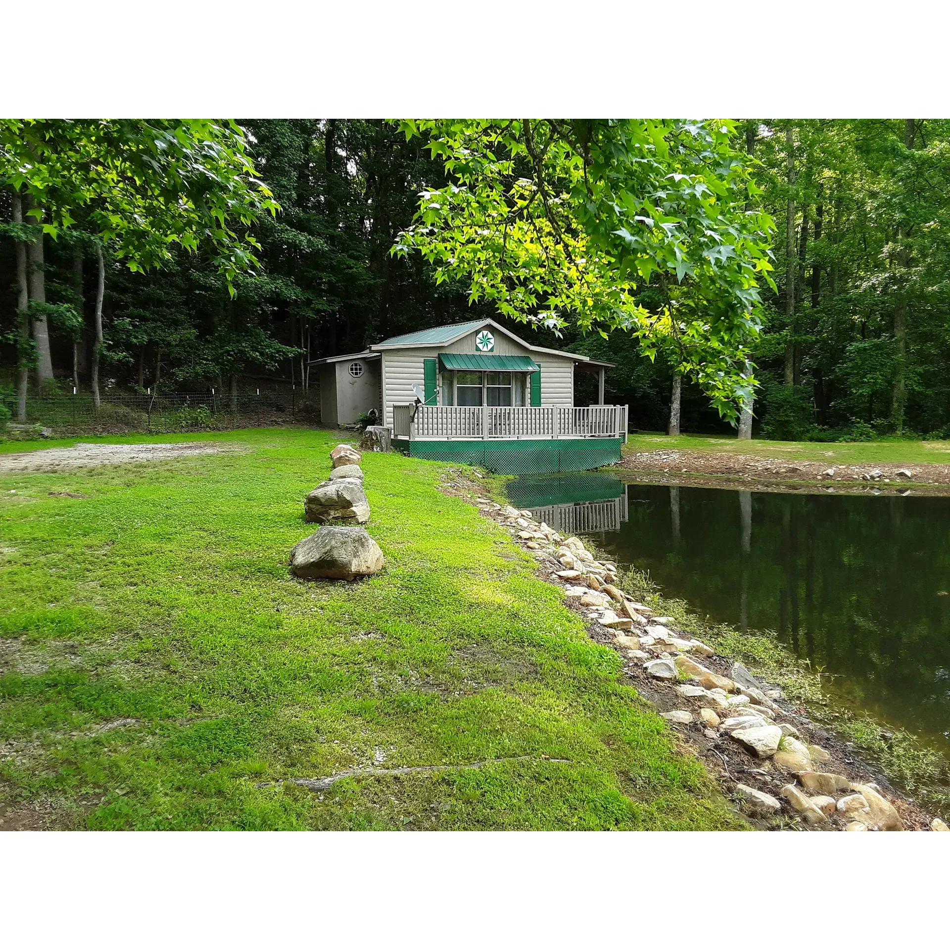 Discover a tranquil oasis perfect for family gatherings, romantic getaways, or a solitary retreat at Paddy Creek Campground. Visitors will find the charming cabins to be an ideal accommodation, offering comfort and coziness suitable for groups of any size. Time and time again, guests leave planning their next visit, with some already envisioning annual family reunions amidst the campground's serene backdrop.

Nature enthusiasts will delight in the rustic setting where laughter is shared around campfires and starlit skies dazzle each night. For those seeking a touch of whimsy, the resident goats provide endless entertainment, particularly the playful antics of the adorable kids. Bird watchers will find themselves in a slice of heaven, immersed in a habitat alive with avian wonders, contributing to the overall peaceful and serene atmosphere that envelops the campground.

This family-operated haven ensures a park-like environment, sitting gracefully in a valley near Lake James, offering various recreational activities. With amenities such as a sparkling bathhouse, a volleyball court, horseshoe pits, and a catch-and-release fishing pond, guests have plenty of activities to enrich their stay. For those looking to explore the area, the campground is a mere 3 miles away from Lake James Marina and Parks, perfect for day trips and adventures on the water.

Paddy Creek Campground's commitment to providing a space where guests can unwind and catch their breath is clear. The peace and tranquility one experiences here make it more than just a place to stay—it becomes a restorative destination where memories are made, and the hustle of busy life fades into the background. Whether seeking solitude or looking to connect with loved ones, Paddy Creek Campgrounds is the perfect location for those who appreciate the great outdoors wrapped in the comfort of a home away from home. Description by ChatGPT.