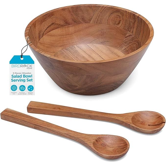 The BIRDROCK HOME 3 Piece Wooden Salad Bowl Serving Set is a stylish and functional addition to any kitchen or dining room. Made from durable acacia wood, this set includes a large salad bowl, serving utensils, and a smaller bowl for dressings or toppings.