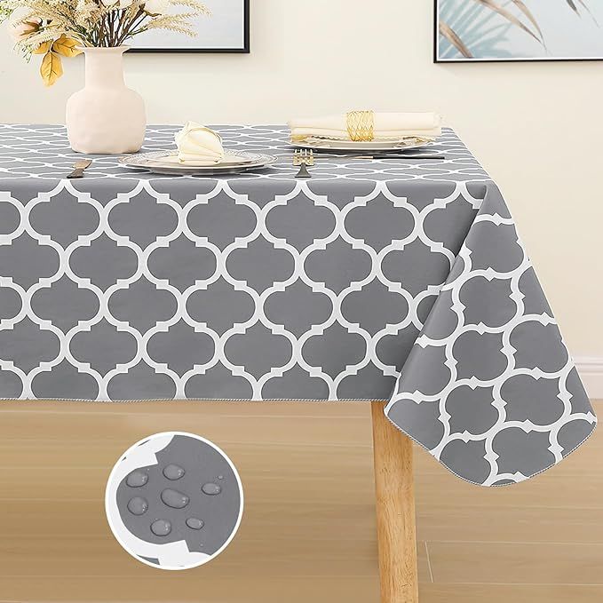 Elevate your dining scene with the Smiry Rectangle Tablecloth – a dynamo of functionality and elegance, suited for all your indoor feasts and al fresco celebrations. Say goodbye to stains and spills; this tablecloth is crafted with high-quality waterproof vinyl, topped with a soft flannel backing.