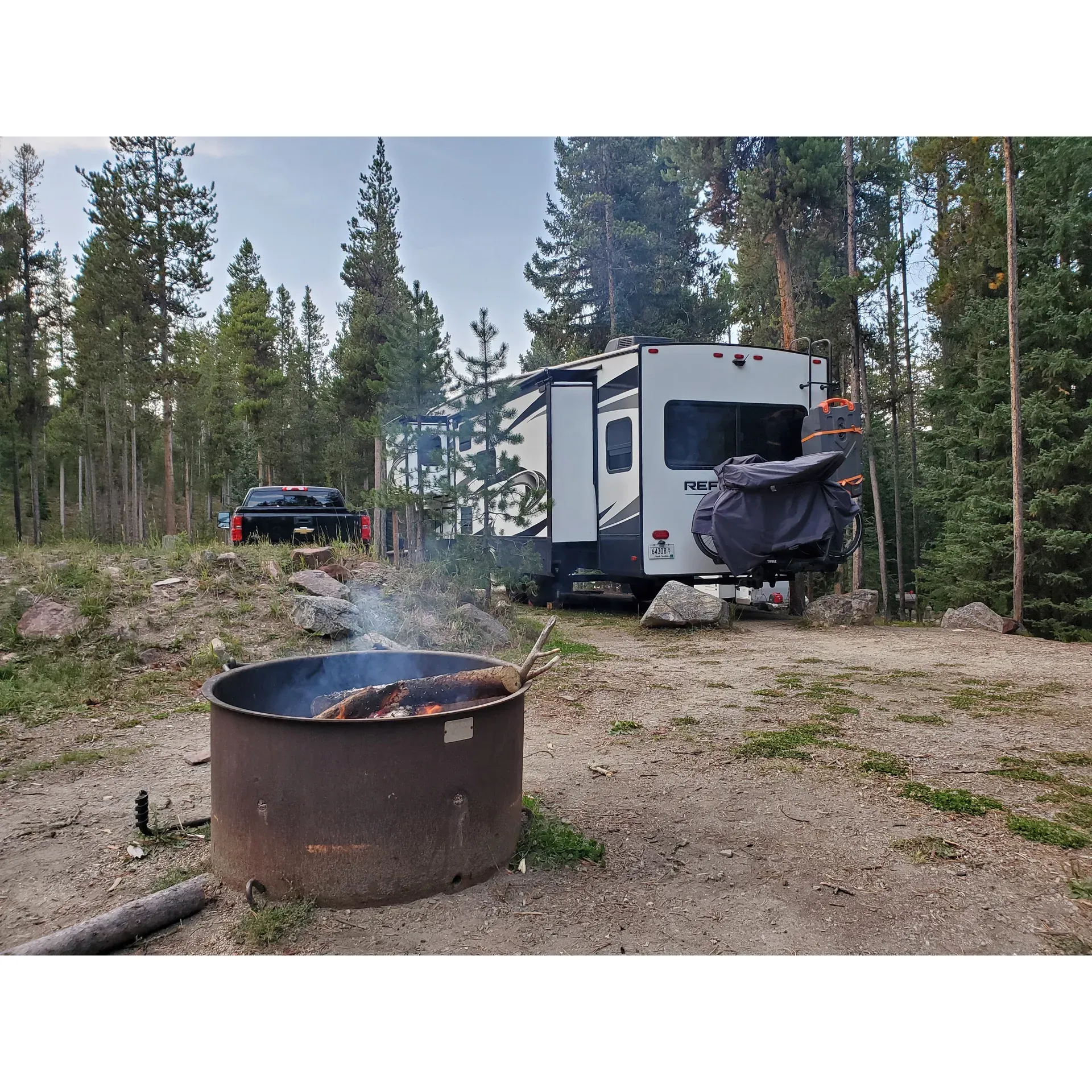 Many Pines Campground is a scenic outdoor sanctuary offering an escape to nature enthusiasts of all backgrounds. Celebrated for its towering pines along a tranquil creek, Many Pines Campground provides not only an idyllic setting but also a variety of recreational activities. Visitors are often delighted by the occasional glimpses of wildlife, including deer, that wander through the spacious, well-spaced sites, ensuring privacy and a sense of seclusion amidst the wilderness.

The campground is a paradise for hikers, with numerous trails inviting adventurers to explore the captivating landscape. Known for its forested paths and the opportunity to immerse oneself in the great outdoors, it's the perfect spot to create lasting memories.

RV, tent, and camper enthusiasts seeking a serene and peaceful retreat will appreciate the campground's accommodating spaces and the gentle ambiance created by the natural canopy above. Moreover, the absence of cell service is a blessing for those looking to unplug and reconnect with nature, though it's always wise to come prepared for the off-grid experience.

Strategically positioned within the Little Belt Mountain Range in Montana, Many Pines Campground is a superb gateway to exciting activities such as ATV motor biking, horseback riding, and more. Additionally, being a short distance from the local ski area, Showdown Montana, and the charming town of Neihart on scenic Highway 89, campers can easily venture out for additional mountain experiences and local sights.

Overall, Many Pines Campground is not just recommended by its visitors; it's cherished as a destination where peace, adventure, and natural beauty converge, making it a sought-after location for those eager to indulge in the tranquil wilderness and outdoor fun. Description by ChatGPT.