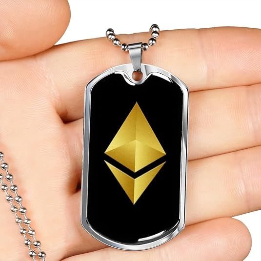 The Express Your Love Gifts Ethereum Cryptocurrency Black Gold Crypto Necklace is a stylish and unique piece of jewelry that is perfect for cryptocurrency enthusiasts. The necklace features the Ethereum cryptocurrency logo in black and gold, adding a touch of sophistication to any outfit.