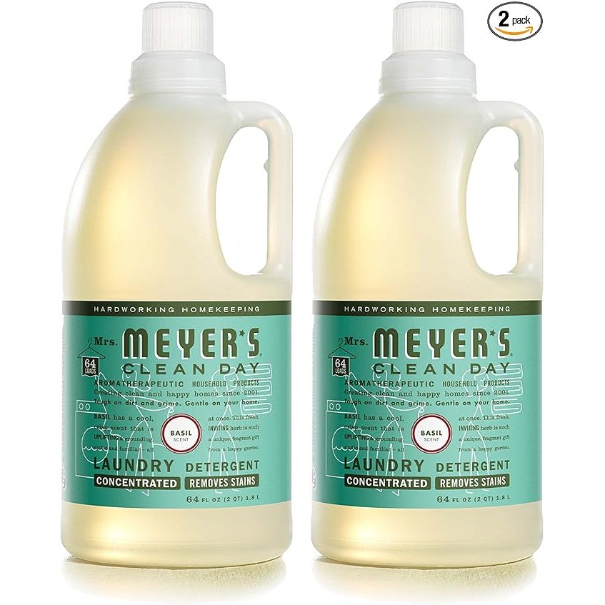 MRS. MEYER'S CLEAN DAY Liquid Laundry Detergent is a biodegradable formula infused with essential oils, specifically basil, that is designed to effectively clean your laundry while leaving a fresh and natural scent. The detergent comes in a 64 oz bottle, with each pack containing 2 bottles, providing a total of 128 loads of laundry.