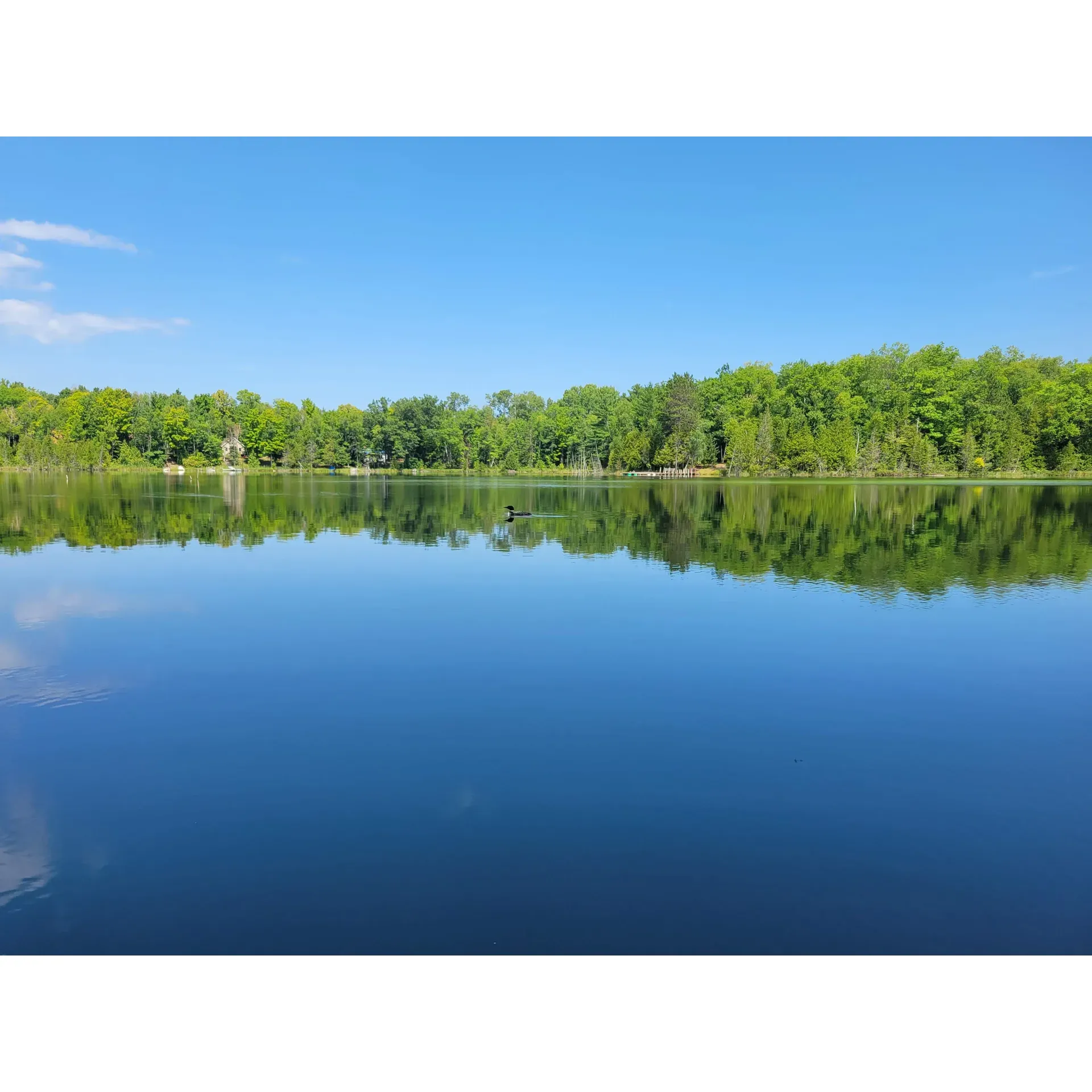 Twin Lakes State Forest Campground offers a serene outdoor experience for campers seeking tranquility and adventure in equal measure. As a small destination with just 11 sites, the campground provides an intimate and peaceful setting, where each of the well-sized, wooded lots creates a private retreat for tents or small trailers. Campers can delight in the impeccably maintained facilities, including clean pit toilets that ensure a comfortable stay amid the natural surroundings.

For those who love to be on the water, the campground presents a tranquil, protected lake ideal for kayaking and canoeing enthusiasts. Though it doesn't offer waterfront sites, the unique 'carry-in' boat launch adds to the sense of adventure as visitors descend a short staircase to embark on their aquatic explorations. The calm Twin Lakes waters are a haven for anglers seeking a rewarding catch, and the presence of loons provides a mesmerizing soundtrack, especially enchanting at dawn.

Complementing the water-based activities, the campground is a hidden gem for hikers. Just a short distance away, miles of well-marked trails unfold through the forest, offering a lush environment for a day's trek. The nearby network of trails leads explorers through the scenic landscape, waiting to be discovered by those willing to venture outside the campground.

Nature lovers will appreciate the campground's status as a no-wake wildfowl sanctuary, further enhancing the spot's reputation as a peaceful haven. With its diverse wildlife, picturesque bays, and coves, the area is a soul-cleansing retreat that invites guests to navigate the waters at a leisurely pace or simply relax lakeside at the available dock. Twin Lakes State Forest Campground remains a cherished destination, where visitors can enjoy the simplicity of rustic camping combined with the enriching experiences of fishing, boating, and connecting with the great outdoors. Description by ChatGPT.