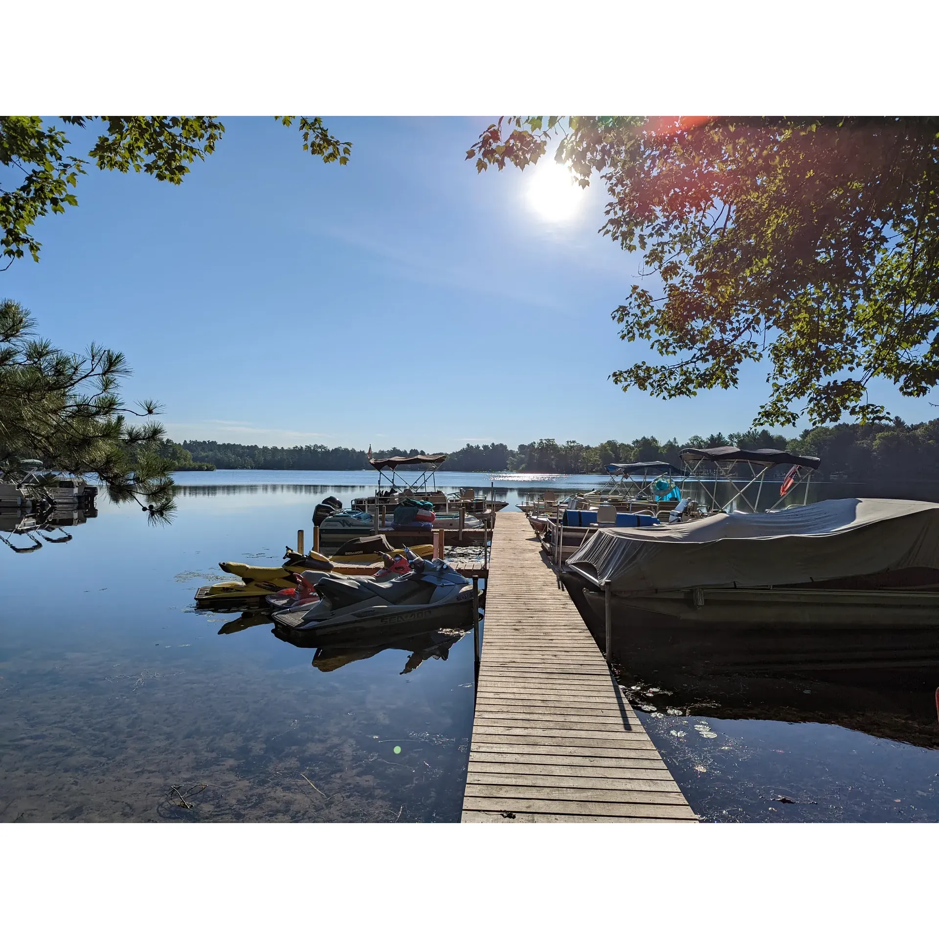 Wilson Lake Campground & Resort offers its guests an idyllic outdoor experience, complemented by the continuous enhancements and expansions underway. Known for its vibrant atmosphere and exceptional cleanliness, this family-friendly retreat ensures a welcoming stay for all its visitors. The recently undertaken renovations signify the commitment of the new ownership to elevate the guest experience, with additions including more camping sites and a refreshing pool to beat the summer heat.

Enjoy the serene ambience of a clean, picturesque lake bordered by graceful pines, and take advantage of the large, well-maintained camp sites that offer ample room for your camping needs. Whether you're an RV enthusiast requiring space for a big rig or seeking a cozy corner for a tent, the resort is accommodating to all sorts of campers. Do remember to bring levelers for an optimal setup.

Recreational opportunities abound, with free kayaks and canoes inviting guests to explore the tranquil lake waters. The weed-free beach area is an ideal spot for some sun-soaking or building sandcastles with the little ones. On land, children can revel in play with the delightful new playground equipment, ensuring there’s ample fun for the whole family.

The campgrounds are complemented by efficiently laid-out utilities, and recent upgrades to the electrical and mechanical systems improve comfort and convenience for all guests. Visitors can expect pristine bathroom and shower facilities maintained to high standards of cleanliness and hygiene.

The social heart of the resort is enlivened by a quaint bar where guests can unwind and mingle after a day full of adventure. Although the site is undergoing improvements, its charm and allure remain well intact, providing a spacious and attractive environment that doesn't feel overcrowded even when hosting a significant number of campers.

The attentive and responsive staff, including helpful team members like Jamie, ensures questions are answered, enhancing your planning and stay. With the owners passionately devoted to crafting a premier camping destination, Wilson Lake Campground & Resort emerges as a promising choice for memorable getaways and serene escapes into the embrace of nature. Guests are excitedly returning, eager to witness the unfolding improvements and to once more immerse themselves in the warmth and beauty of this exceptional lakeside haven. Description by ChatGPT.