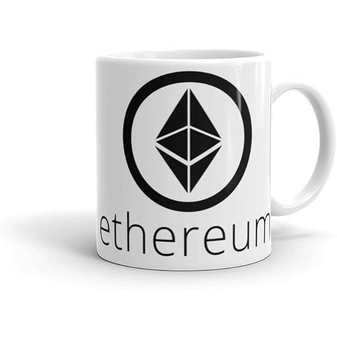 The Ethereum 11oz White Coffee Mug Cryptocurrency Eth Decentralized Black Coin Traders is a white coffee mug featuring the Ethereum logo and the phrase "Cryptocurrency Eth Decentralized" in Portuguese. This mug is designed for cryptocurrency enthusiasts who support the decentralized nature of Ethereum.