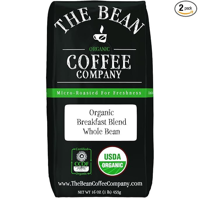 The Bean Organic Coffee Company Breakfast Blend is a medium dark roast ground coffee known for its rich and robust flavor profile. Each 16-ounce bag contains a pack of 2, offering a total of 32 ounces of premium organic coffee. The coffee is sourced from organic farms and is certified by USDA Organic.