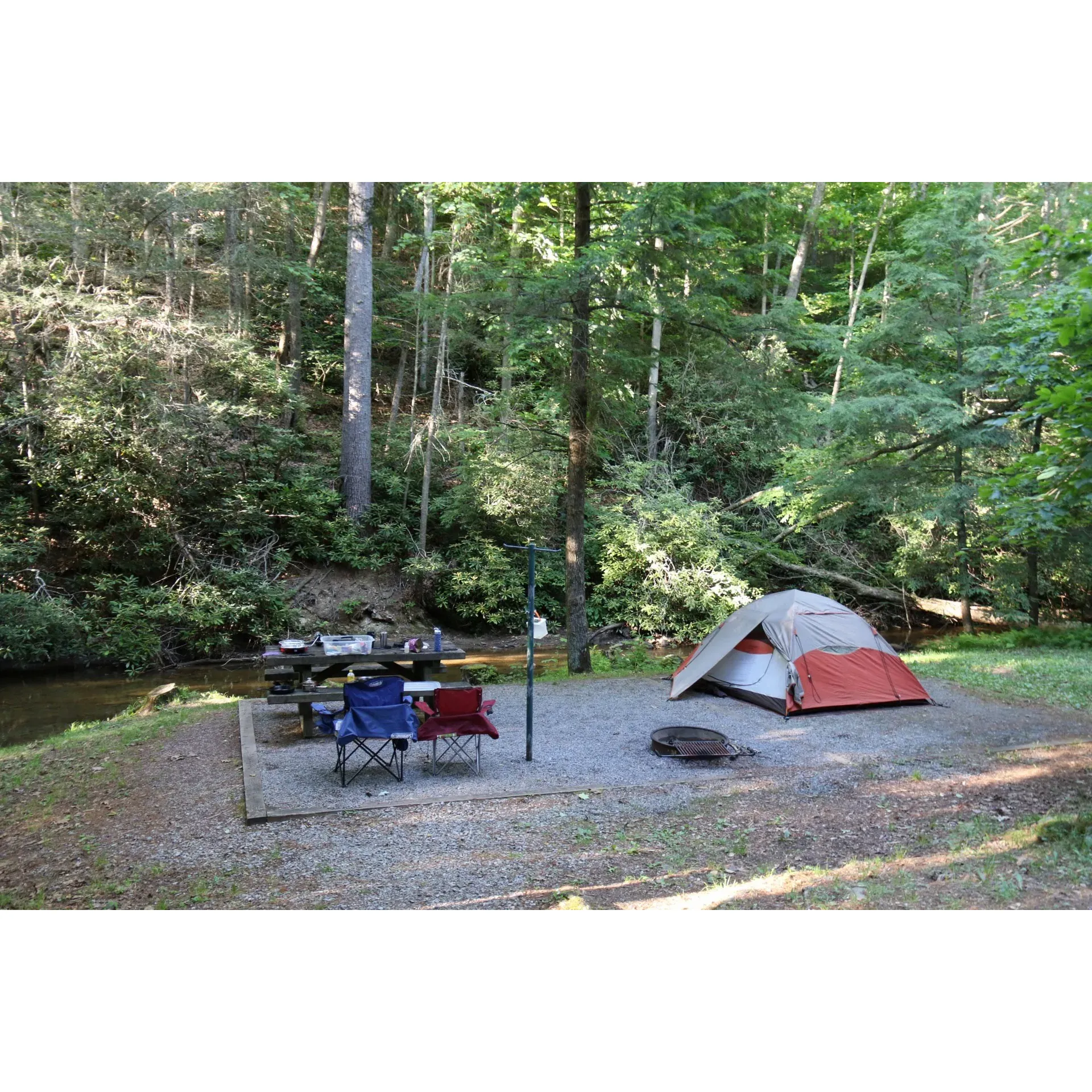 Hurricane Campground offers a serene and picturesque retreat for outdoor enthusiasts and families looking to enjoy the beauty of Virginia's wilderness. With its sprawling, well-maintained sites offering a generous distance between neighbors, guests can bask in the tranquility and privacy that accompany each camping spot. A delightful creek flows gently through the campground, providing a melodious backdrop to an array of creekside sites that offer campers the soothing sounds of nature right at their doorstep.

This beloved destination has been hosting contented visitors for over a decade, offering the comfort of modern amenities such as showers and flush toilets, which are always kept in immaculate condition thanks to the dedicated campground hosts. The hosts, known for their kindness and eagerness to ensure guests have a memorable stay, add to the campground's charm and community feel.

For the adventurous, Hurricane Campground is a treasure trove of outdoor activities with direct access to numerous trails, including the world-renowned Appalachian Trail directly from the grounds. Whether you're a hiker, a nature lover, or someone who simply wants to retreat from the hustle and bustle of daily life, this campground serves as an ideal basecamp for exploring the surrounding scenic trails, waterfalls, and interest points all within a short drive.

Each campsite in the area offers something unique, with some positioned to provide ultimate seclusion and close proximity to the convenience of bathroom facilities. The campground is characterized by its quiet atmosphere, where respect among campers is the norm, ensuring a peaceful experience. The stunning natural environment includes mature, tall timber and the swift, singing creek, enhancing the campground's idyllic setting.

Whether opting for a creek-facing plot or a site elevated through easy switchbacks, visitors will find themselves enveloped in a lush, private forest retreat. Outdoor enthusiasts can immerse themselves in the splendor of the changing seasons, particularly the perfect weather in October, and engage with a community of like-minded hikers.

For families looking for a mountain getaway, Hurricane Campground offers an inviting space for tent camping and dry RV camping, complimented by the advantageous proximity of amenities and natural attractions. With its combination of accessibility to trails, the Appalachian Trail, and cascading waterfalls, all set within a clean, safe, and hospitable environment, it's clear why many consider this campground a not-so-secret gem of Virginia. Description by ChatGPT.