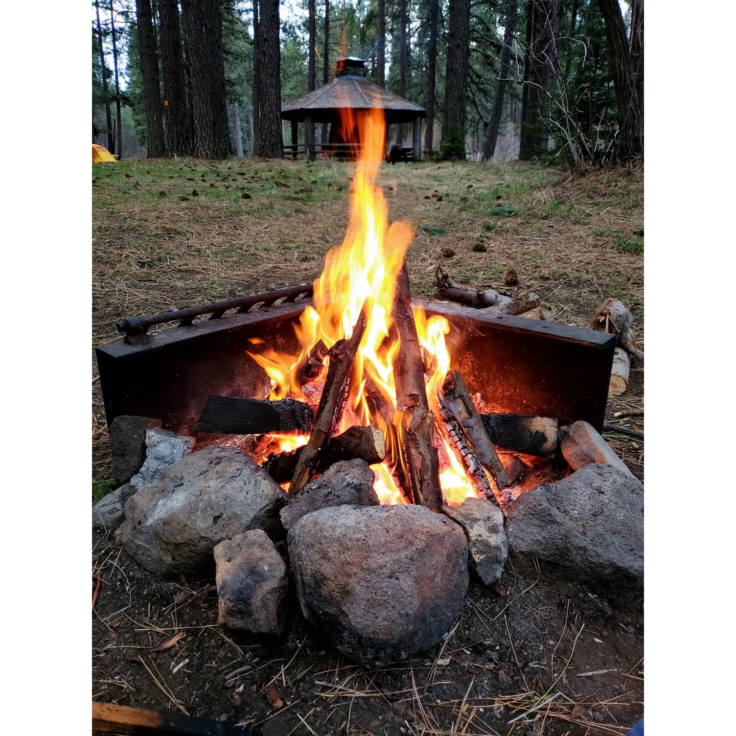 Camp Sherman Campground is a serene, picturesque retreat offering a quintessential outdoor experience. Visitors who have stayed rave about its spacious campsites accommodating up to 4-5 tents, complete with fire grates perfect for cooking up a campfire feast on a cast iron griddle. Amidst the natural splendor, guests can enjoy the convenience of a picnic table at their site and the cleanliness of nearby pit bathrooms, meticulously maintained and cleaned each morning.

Families particularly appreciate the campground's river access. Shallow waters along this stretch of the McKenzie River provide a safe and delightful playground for children and dogs alike. Outdoor enthusiasts can take advantage of the beautiful and gentle trail leading to Camp Sherman general store, which is just a little over an easy mile walk away.

Camp Sherman Campground is praised for its tranquility, often described as a peaceful escape that allows campers to immerse themselves in nature's stillness. Sites are well-spaced to afford privacy and solace, fostering a sense of seclusion and respite. During extraordinary times such as the Covid-19 pandemic, the campground's layout ensures a safer environment, where social distancing is naturally integrated.

In additional to its peaceful atmosphere, the campground offers the convenience of garbage service and well-maintained amenities, including two vault toilets for added hygiene and comfort. The grounds cater to both tent campers and RV travelers, boasting pull-through sites that are reasonably level and generously sized. During the warmer months, when temperatures permit, visitors can access potable water, further accentuating the campground's dedication to a hassle-free stay.

For those inclined towards angling, the area surrounding the campground is designated as a fly fishing haven, providing the perfect spot for enthusiasts to indulge in their hobby. Lastly, guests are invited to explore the delightful trail leading to a nearby bridge, which provides a scenic roundtrip hike along the riverbank, adding to the array of recreational activities accessible right from the campground.

Offering beauty, relaxation, and a well-maintained setting, Camp Sherman Campground is a coveted destination for campers looking to soak in the natural splendor while enjoying the comforts of a thoughtfully preserved outdoor space. It's a place that fills up quickly, testament to the memorable experiences it guarantees. Description by ChatGPT.