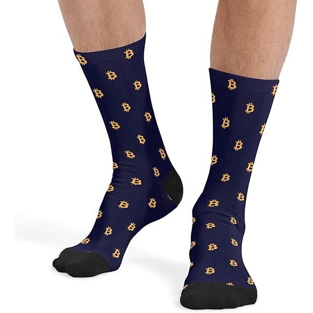 These men's dress socks are designed with a Bitcoin sign print, making them a unique and stylish gift for any man. With a length of 15.75 inches and a crew sock design, they provide ample coverage and warmth for the feet and lower legs. The stretchy material ensures a comfortable fit that stays in place during sports or other activities.