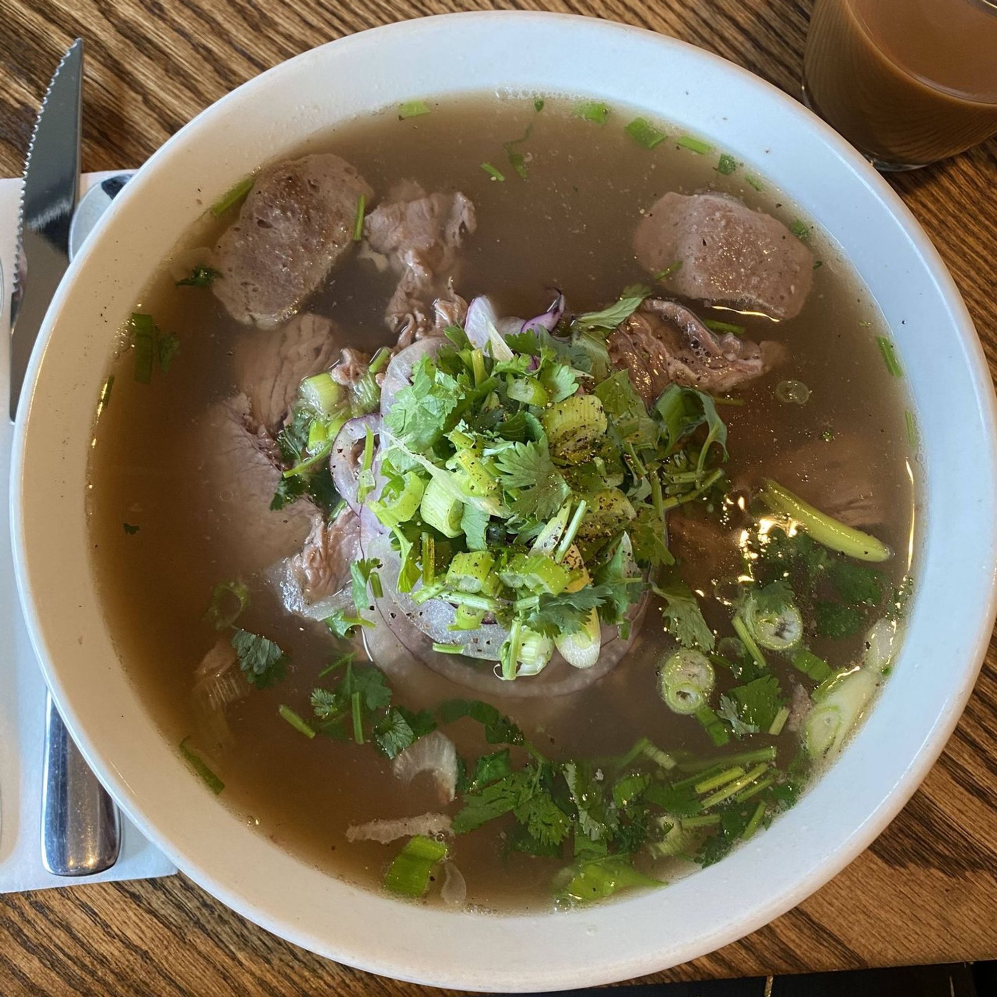 Sliced beef sirloin, brisket, meatballs, rice noodles, onions, cilantro, 18-hour-simmered beef bone broth. GF