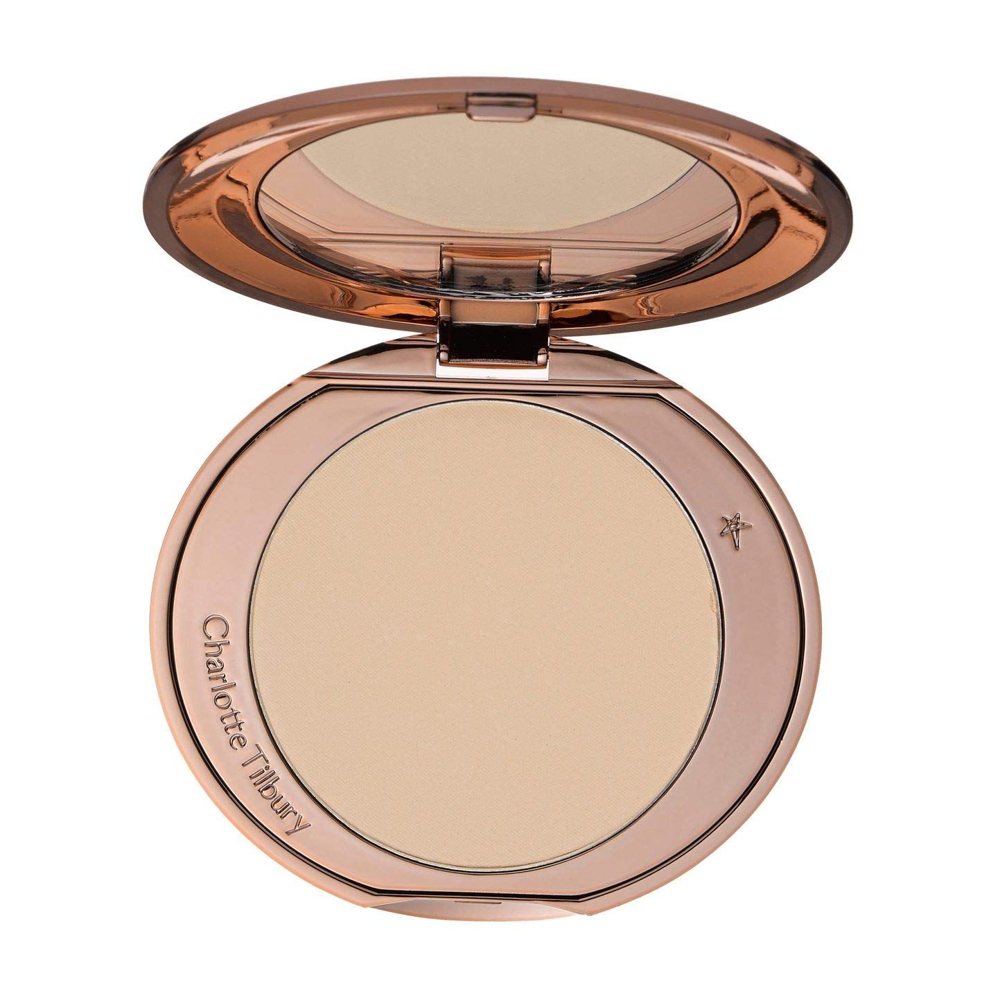 Transform your skin with the luxurious touch of Charlotte Tilbury's skin-perfecting powder, the ultimate solution for managing an oily T-zone or achieving that impeccable, airbrushed finish.