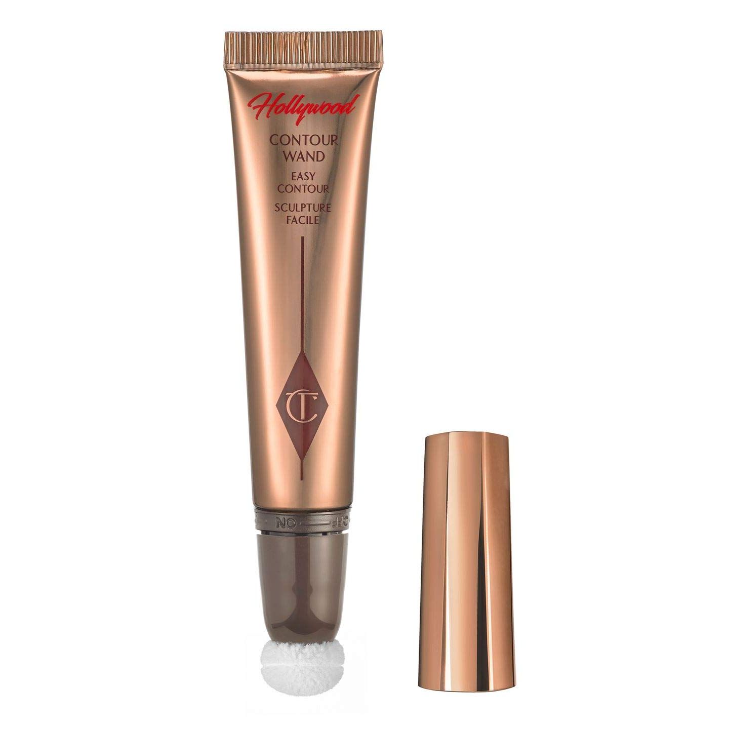 Achieve chiseled, celebrity-inspired cheekbones with ease using the Hollywood Contour Wand in FAIR/MEDIUM. Perfect for those with fair to medium skin tones, this must-have makeup tool allows you to sculpt, define, and highlight your features for a natural-looking, red-carpet-ready finish. The blendable, creamy formula glides on smoothly, and the precision cushion applicator ensures a flawless application every time. Whether you're a makeup novice or a seasoned artist, this contour wand will become an indispensable part of your beauty arsenal.