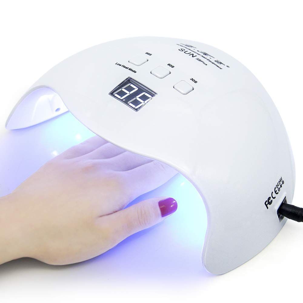 This 40W Gel Nail UV LED Lamp is the perfect solution for those who prefer taking care of their nails at home while saving money. Equipped with 21 LED lights, 3 timer options of 30s, 60s, and 99s, this lamp is suitable for drying most nail UV gel, UV top coat, and LED nail gel.