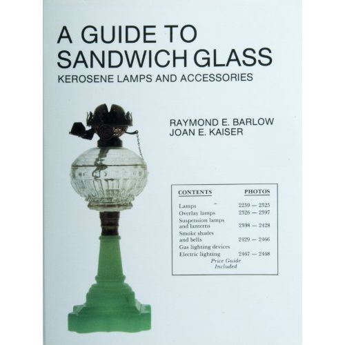 "A Guide to Sandwich Glass: Kerosene Lamps and Accessories" (Vol. 2) by Raymond E-Barlow and Joan E. Kaiser is a highly informative book that delves into the history and production of Sandwich glass. Specifically, this volume focuses on the kerosene lamps and accessories produced by the Sandwich Glass Company during the mid-19th century.