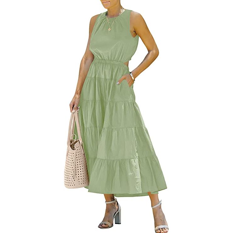 Introducing the perfect dress for all your summer occasions - the 100% Rayon Sundress! This dress is available in four different sizes (S, M, L, and XL) and features a flattering elastic waistband, a round neckline with elastic, and a tiered skirt that falls gracefully at ankle length.