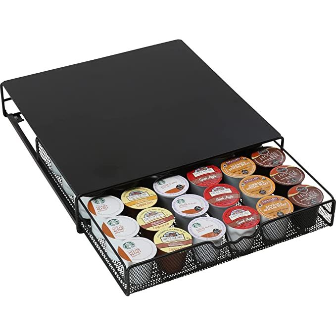 The drawer helps to keep K-Cups organized and easily accessible. It has three rows of compartments, each of which can hold 12 K-Cup pods. The drawer slides out smoothly, making it easy to select your desired coffee pod.