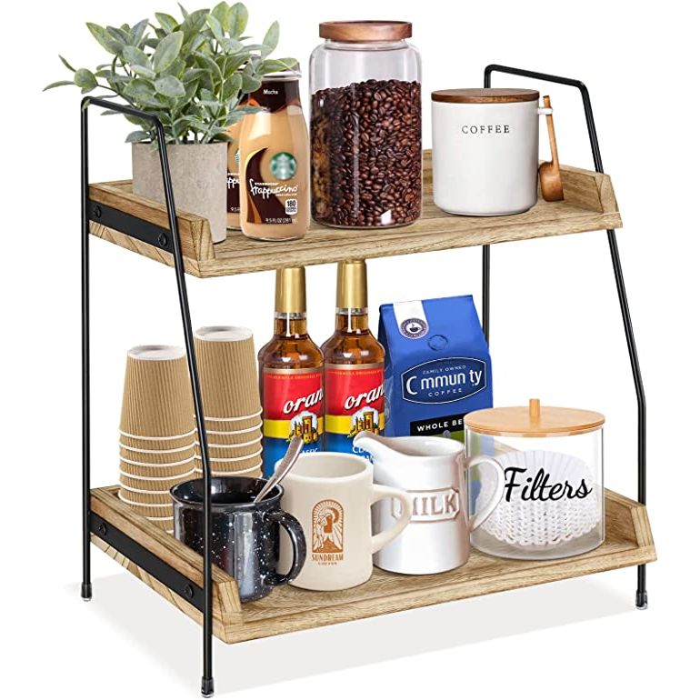 Simplify and streamline your coffee bar with a range of coffee bar accessories and organizer countertop units. These essentials are designed to keep your coffee station neat and efficient, saving you time and frustration in the process.
One popular accessory is the Coffee Station Organizer 2 Tier Kitchen Counter Shelf Organizer.