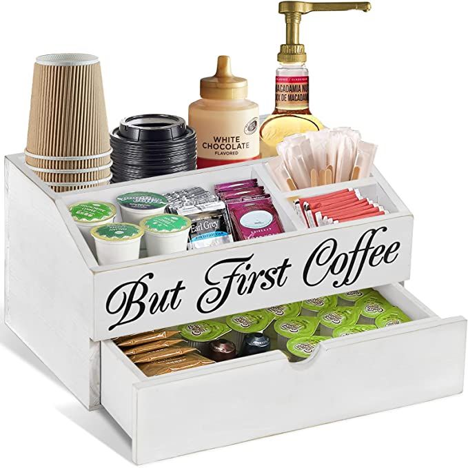 Enhance your coffee experience with the Coffee Station Organizer, a must-have for coffee enthusiasts seeking a neat and organized space. Crafted from durable wood, this elegant K-Cup holder features a convenient drawer that effortlessly accommodates various coffee accessories and condiments.