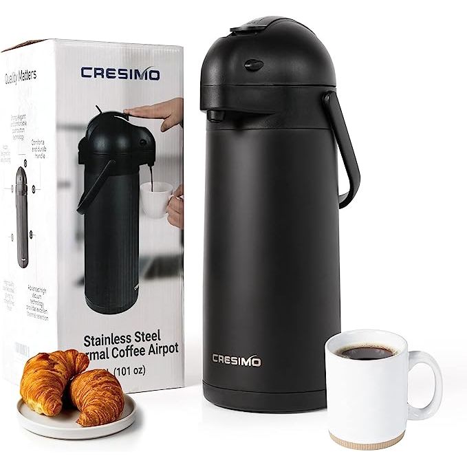 The 101Oz Airpot Thermal Coffee Carafe, created by the esteemed brand Cresimo, is the ultimate solution for keeping your hot coffee and tea fresh and warm for up to 12 hours. This sleek black coffee dispenser is thoughtfully designed with user convenience in mind.