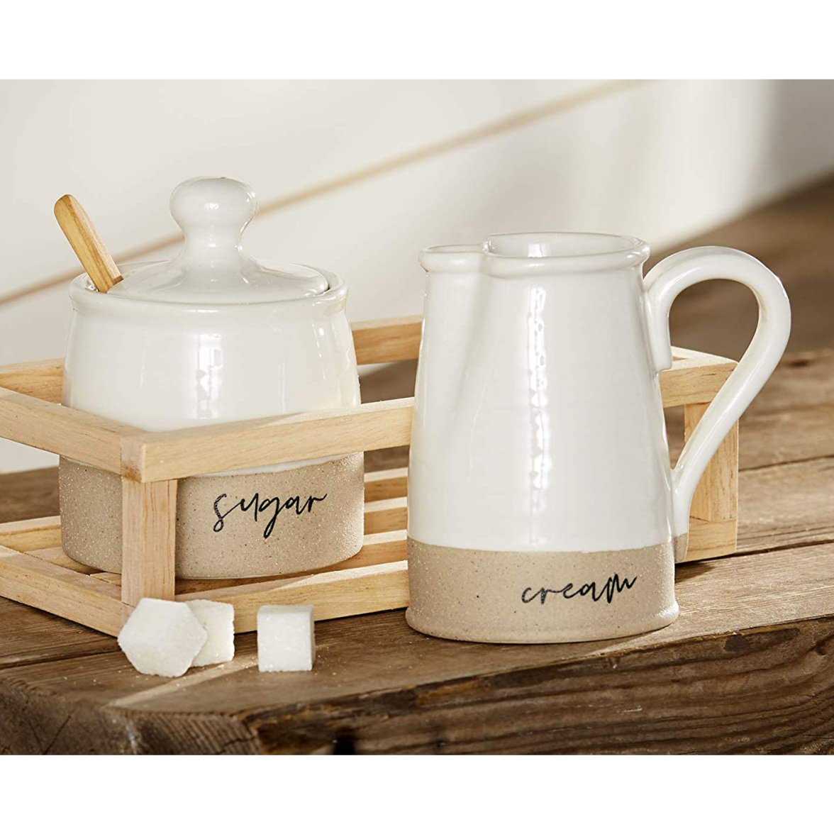 Introducing the Mud Pie Stoneware Cream and Sugar set - a truly elegant and stylish addition to any dining table. Crafted from high-quality stoneware material, this set exudes a sense of sophistication and class.