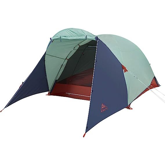 If you're planning a camping trip with family or friends, it's essential to have a high-quality tent to keep you sheltered and safe. The Kelty 4/6 Person Freestanding Rumpus Tent is an excellent choice for those looking for a spacious and durable camping tent.

This tent is designed to accommodate up to six people comfortably, making it perfect for families or groups of friends. The extra-large vestibule serves as a perfect place to store gear, and it also provides an additional space to relax and entertain. The vestibule has a waterproof floor, which keeps your gear dry even if it rains.

The Kelty Rumpus Tent is also freestanding, which means it can be set up anywhere, without requiring stakes or guylines. This makes it easy to move around if you need to change your campsite or if you want to pack up quickly.

The tent itself is made from high-quality materials and features a sturdy frame, making it resilient to wind, rain, and other harsh weather elements. The tent's mesh windows provide excellent ventilation, ensuring that you remain comfortable even on warm nights.

Setting up the Kelty Rumpus Tent is also a breeze, thanks to the color-coded clips and sturdy poles. Even first-time campers will find it easy to set up this tent in a matter of minutes.

In conclusion, the Kelty 4/6 Person Freestanding Rumpus Tent is a great investment for people who are looking for a spacious and durable tent for their next camping trip. With its extra-large vestibule, freestanding design, and easy setup procedure, this tent is guaranteed to provide you with a comfortable and enjoyable camping experience. Description by ChatGPT.