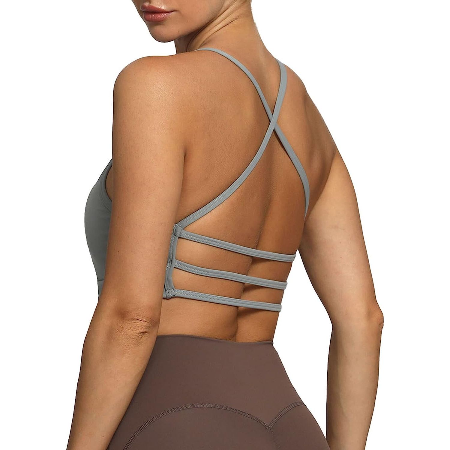 The Aoxjox Women's Workout Sports Bra is designed to provide support for low impact workouts while also emphasizing style and fashion. It is made of a high-quality blend of materials that include spandex and polyester, which makes it stretchy, breathable, moisture-wicking, and comfortable to wear during exercise routines.