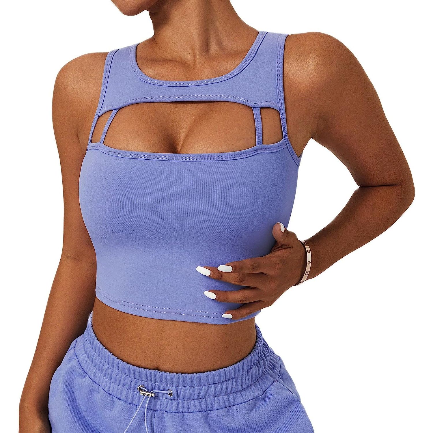 A Women's Longline Sports Bra is a type of workout clothing designed for women who engage in high-level physical activities such as gym workouts or yoga sessions. This bra is made of a blend of high-quality polyester and spandex materials, which helps it to stretch and fit comfortably on the body.