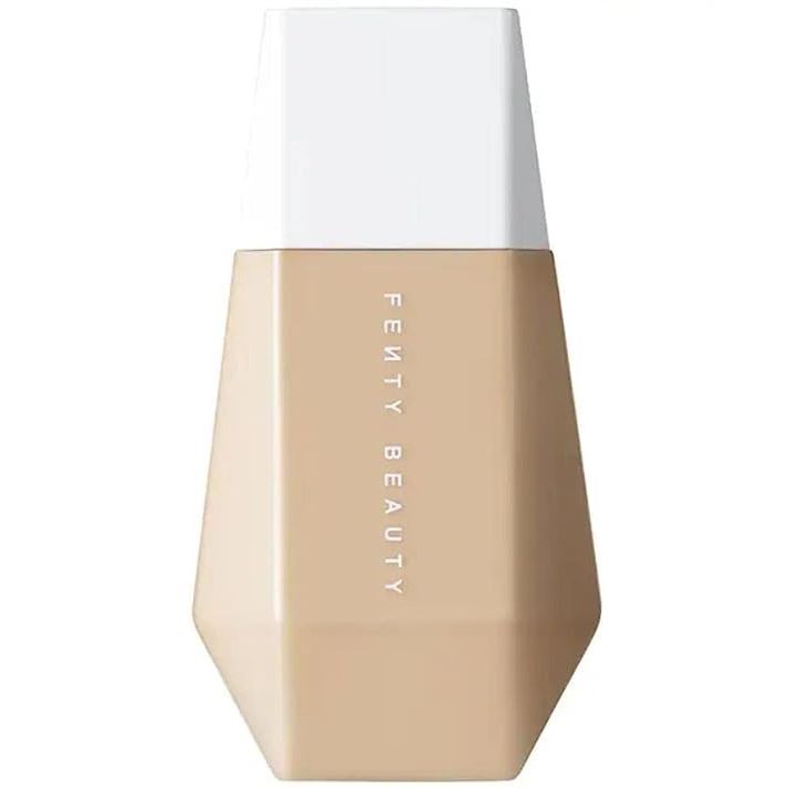 Fenty Beauty by Rihanna Eaze Drop Blurring Skin Tint - COLOR 8 is a skin tint that offers light to medium coverage with a blurring effect. The product comes in a travel-friendly tube with a unique dropper applicator that allows for precise and easy application.